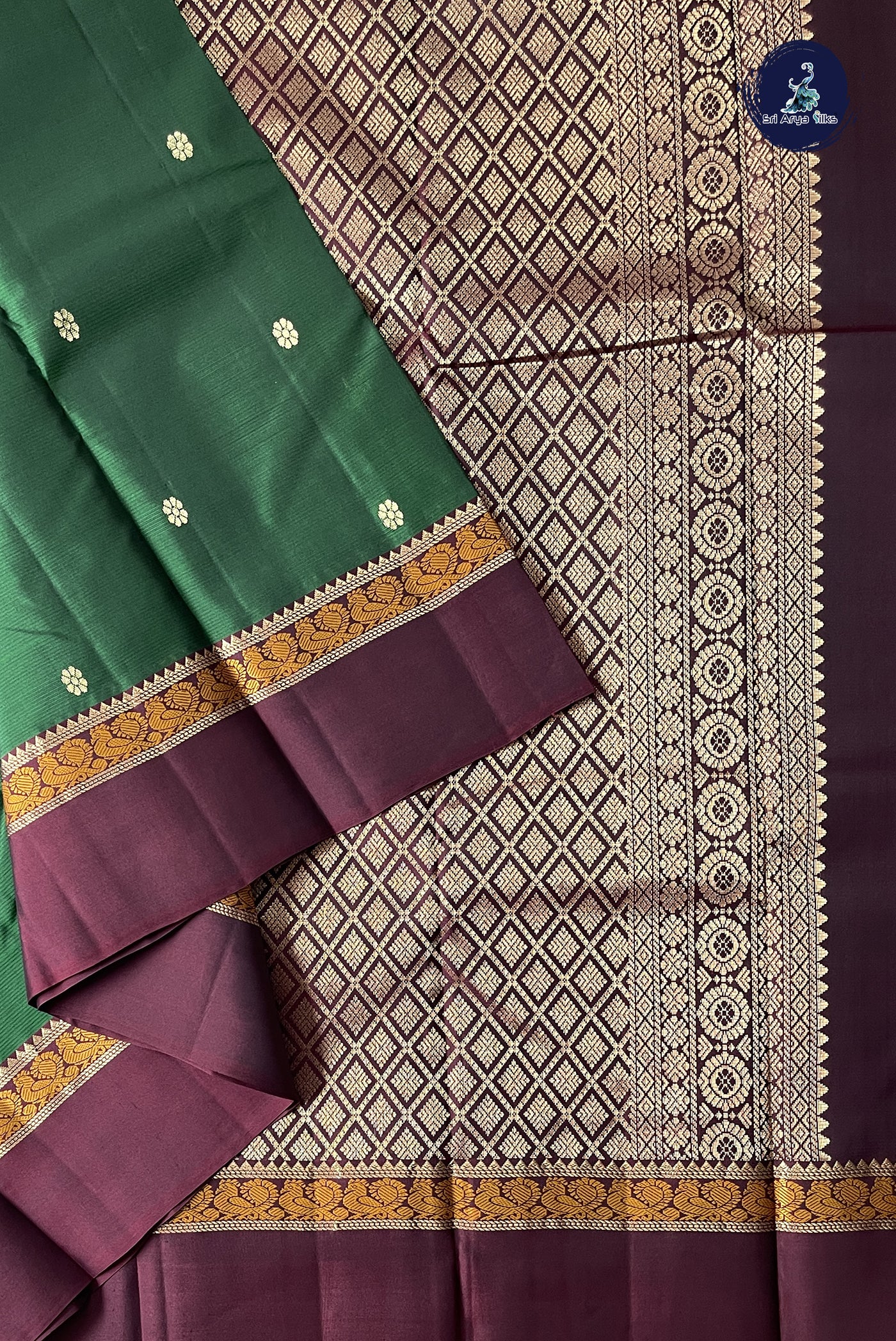 Dark Green Traditional Silk Saree With Zari Buttas Pattern