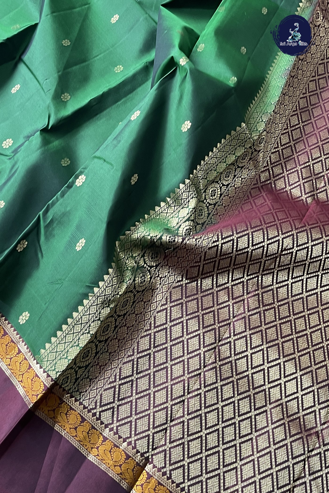 Dark Green Traditional Silk Saree With Zari Buttas Pattern