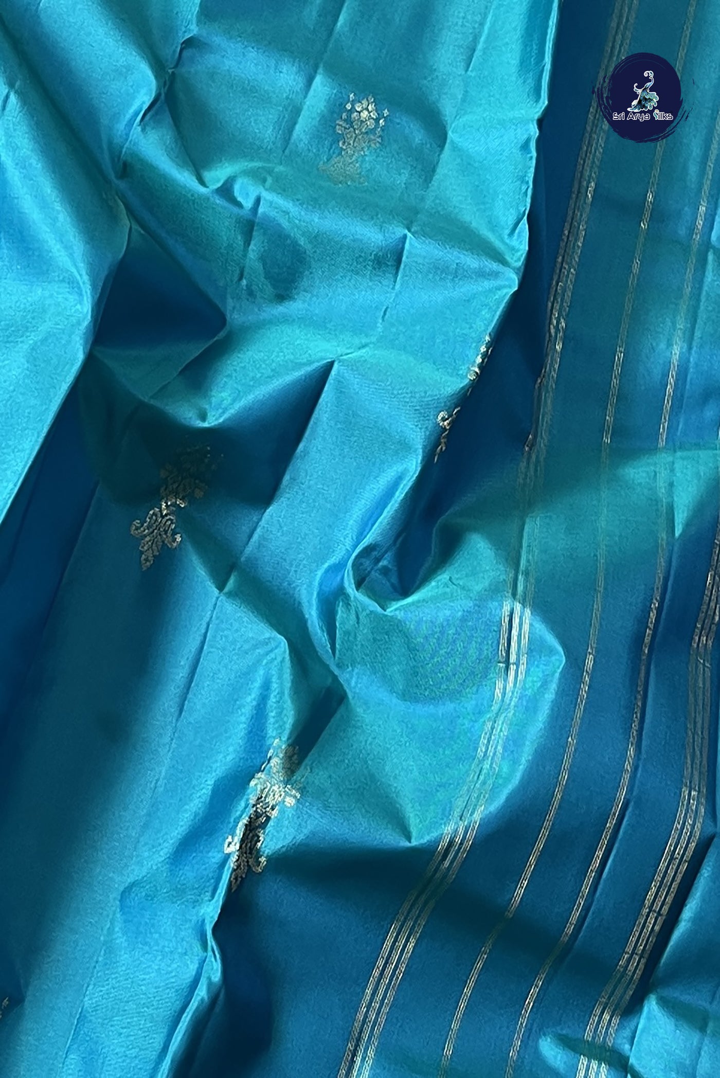 Light Blue Light Weight Silk Saree With Zari Buttas Pattern