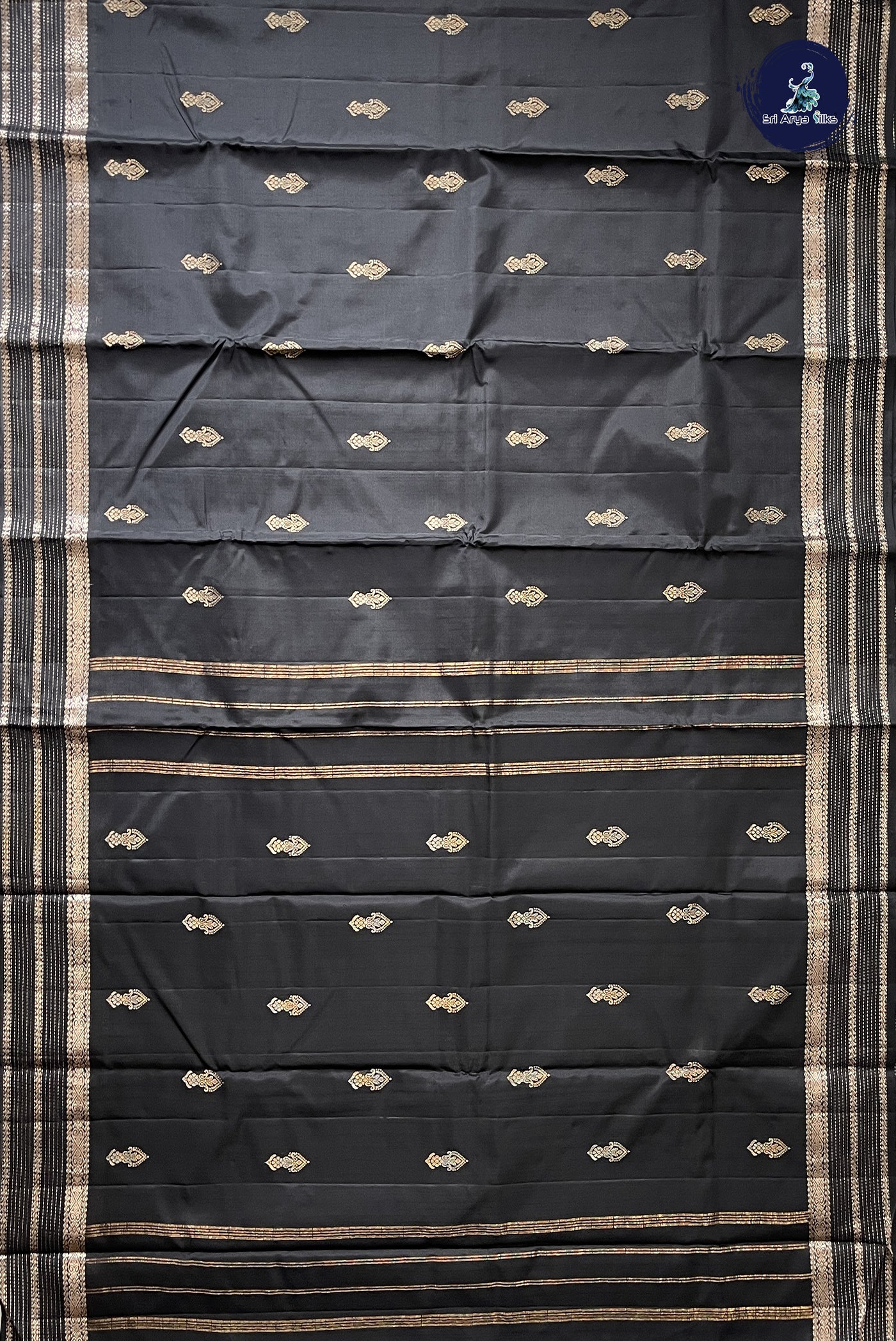 Black Light Weight Silk Saree With Zari Buttas Pattern