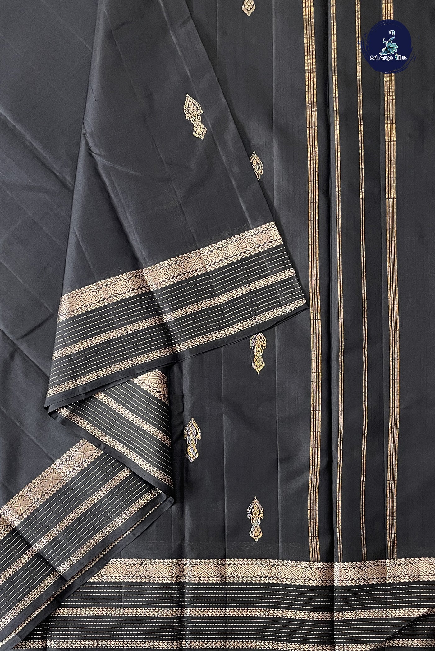 Black Light Weight Silk Saree With Zari Buttas Pattern