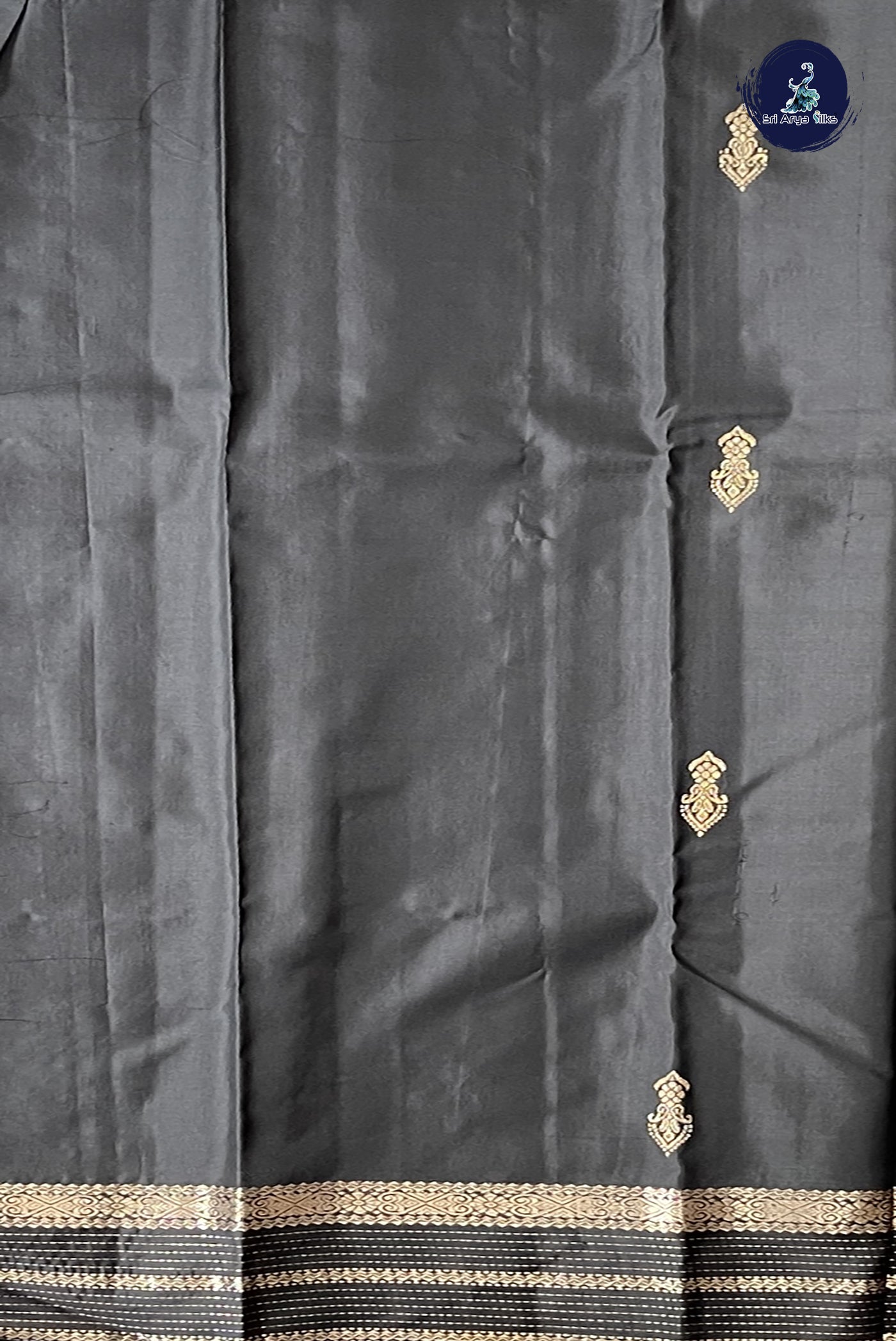 Black Light Weight Silk Saree With Zari Buttas Pattern