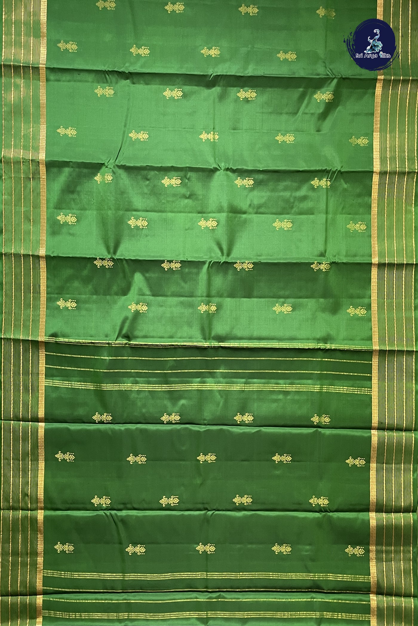 Green Light Weight Silk Saree With Zari Buttas Pattern