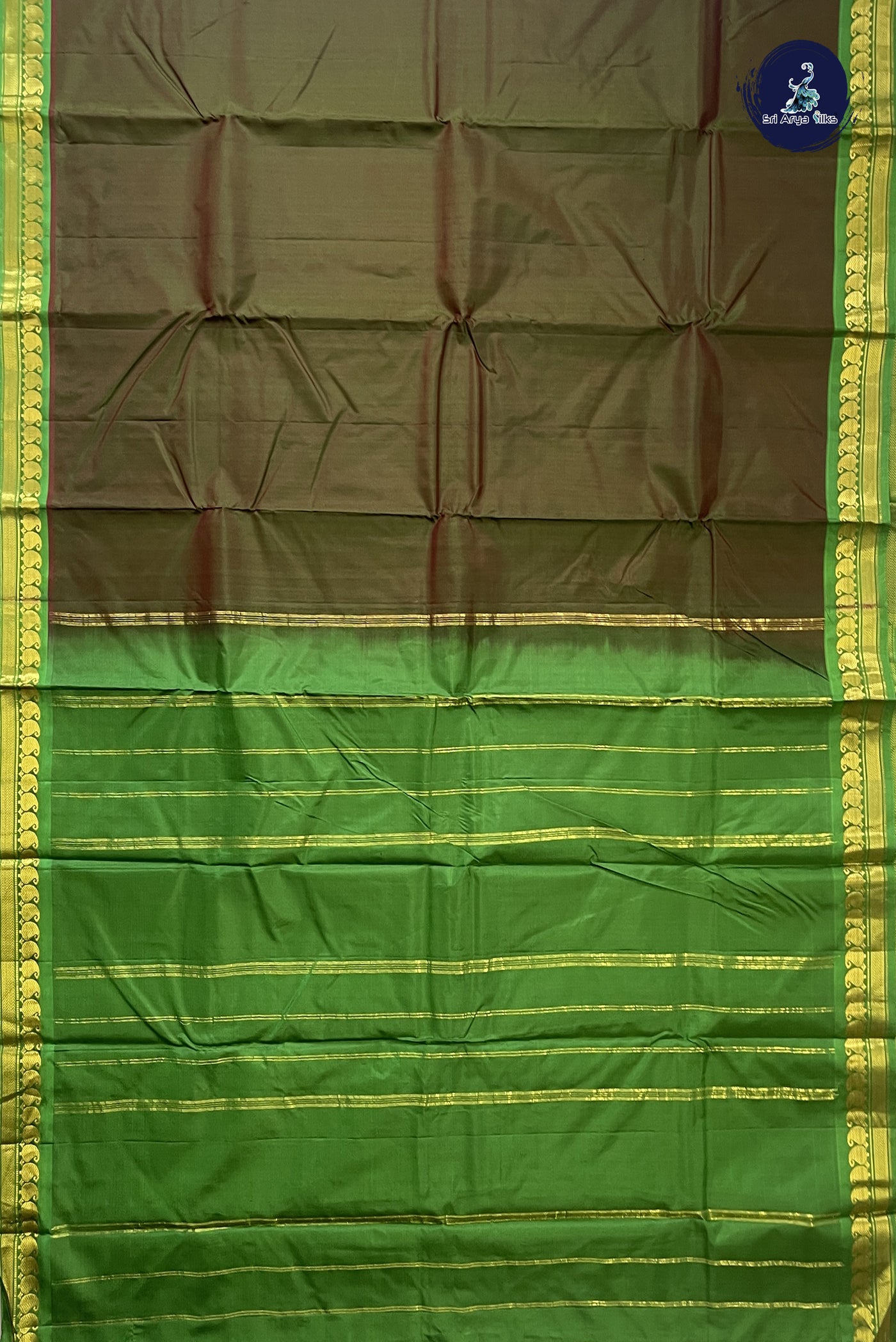 Dual Tone Mehendi Green Light Weight Silk Saree With Plain Pattern