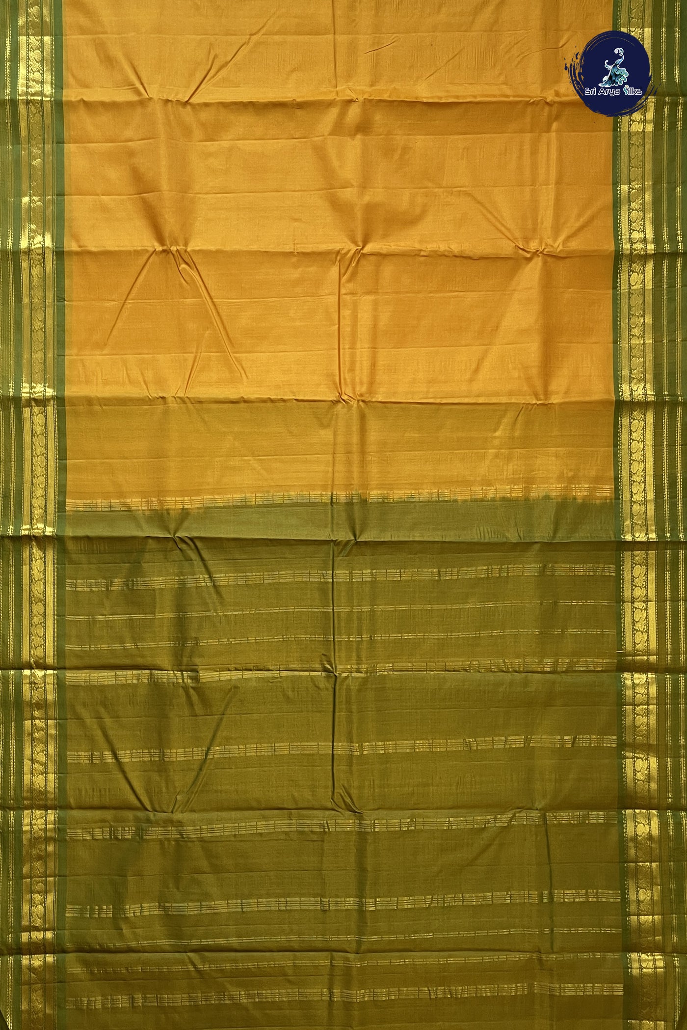 Lite Mustard Orange Light Weight Silk Saree With Plain Pattern