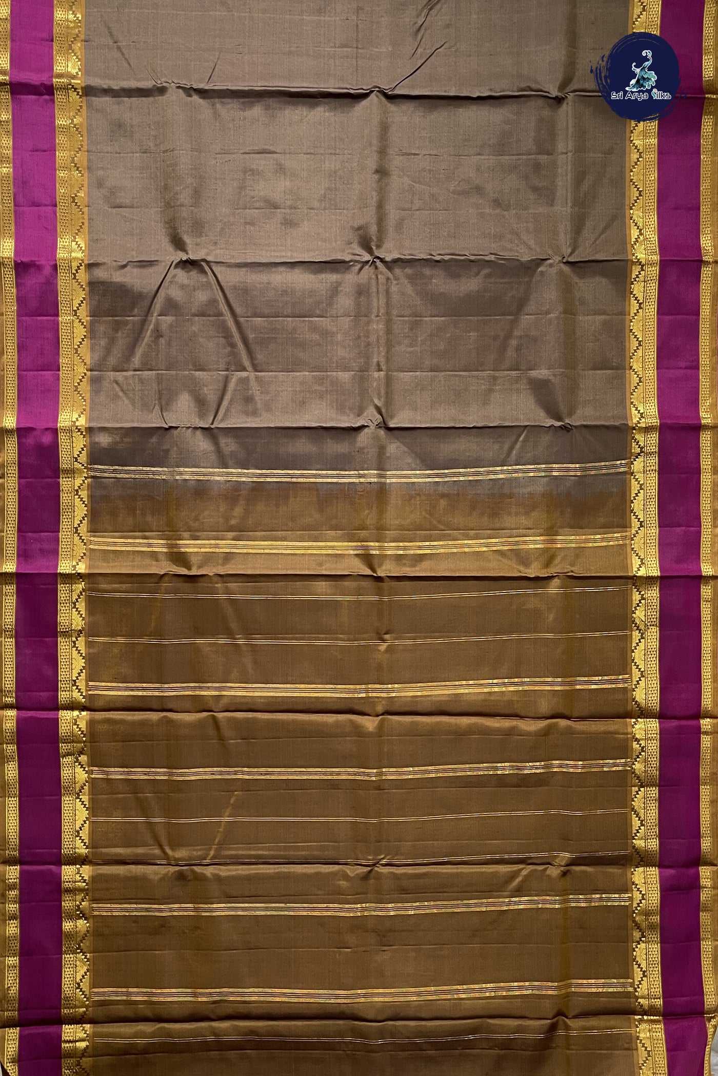 Light Brown Light Weight Silk Saree With Plain Pattern