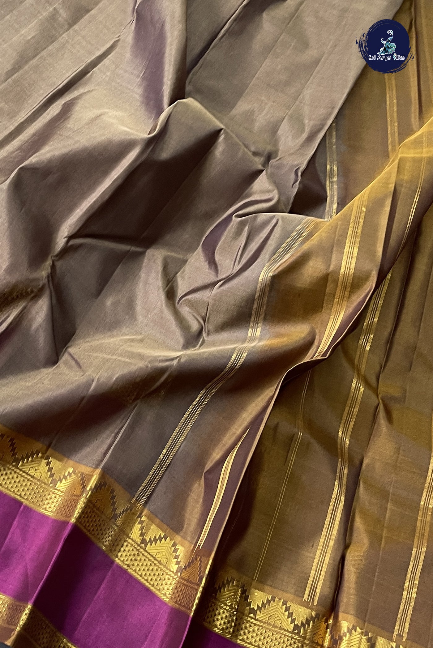 Light Brown Light Weight Silk Saree With Plain Pattern