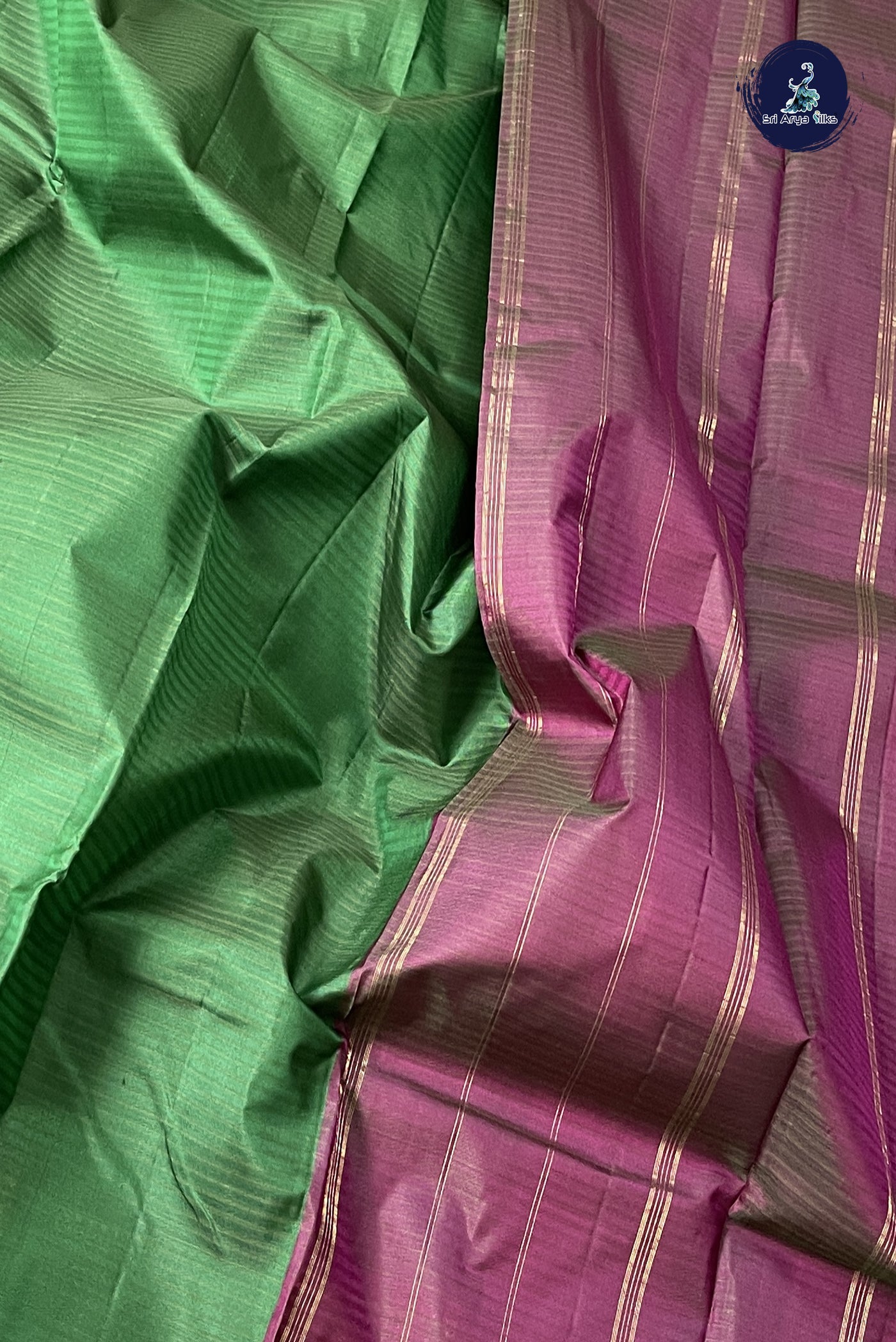 Dark Green Light Weight Silk Saree With Plain Pattern