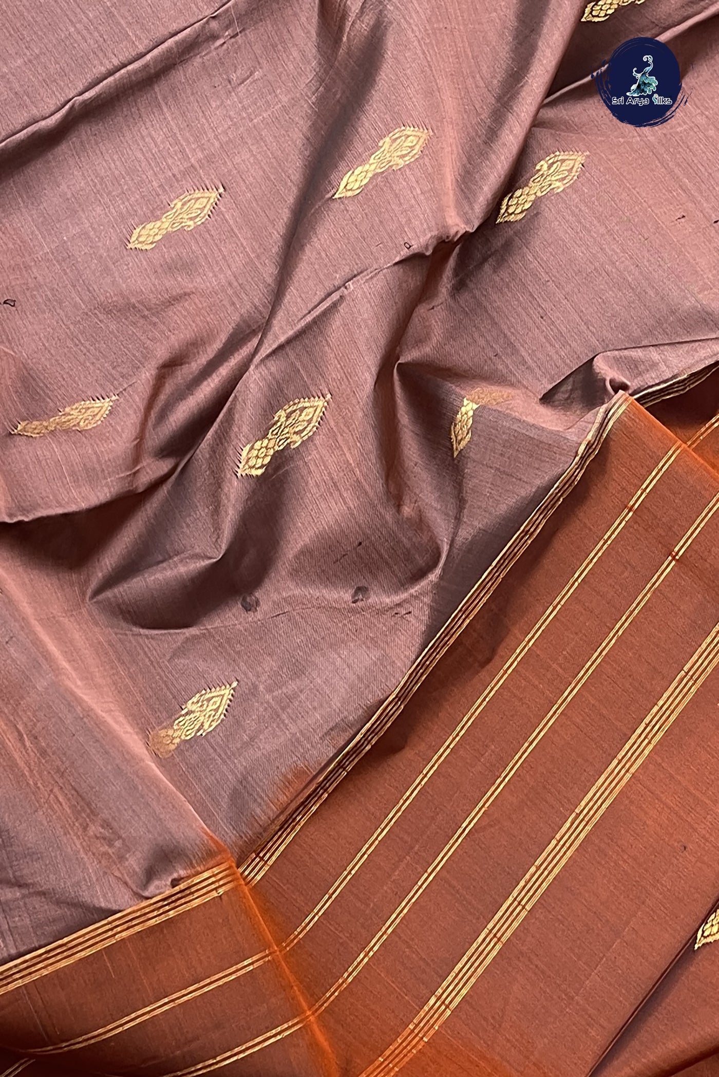 Caramel Pink Light Weight Silk Saree With Zari Buttas Pattern