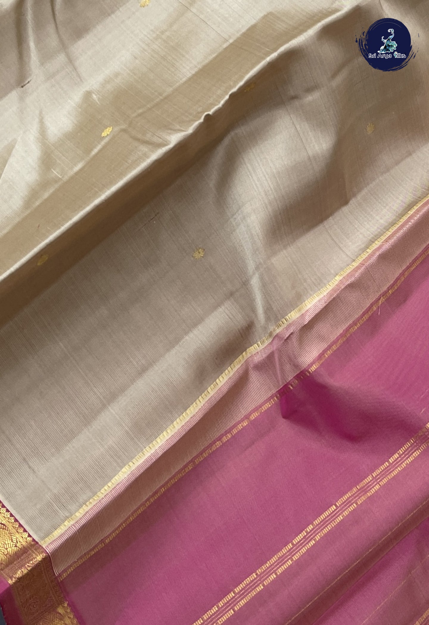 Beige Traditional Silk Saree With Zari Buttas Pattern