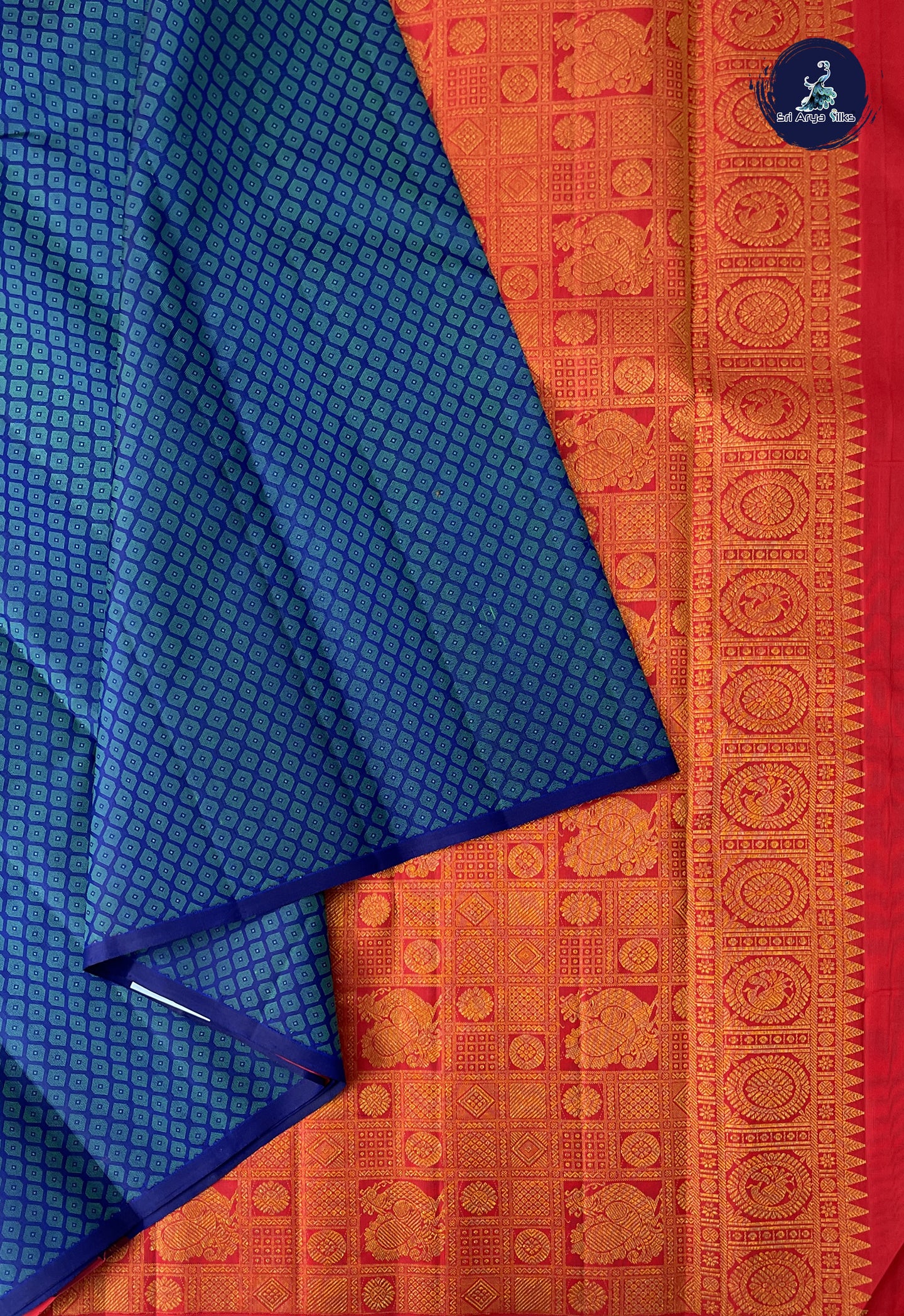 Dark Blue Brocade Silk Saree With Embossed Pattern