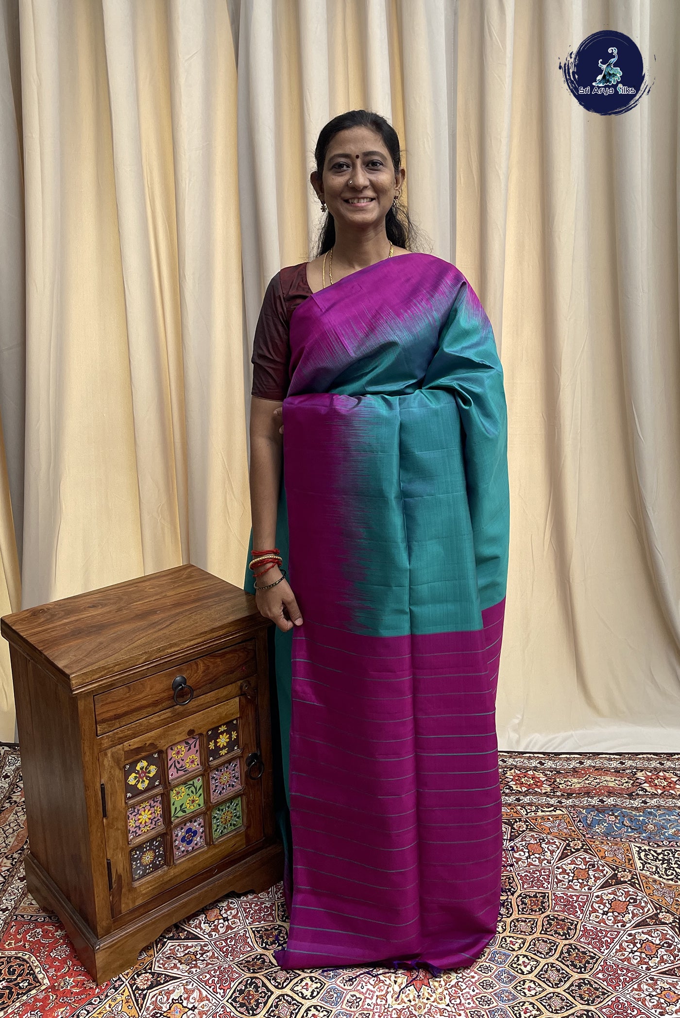 Teal Blue Soft Silk Saree With Plain Pattern