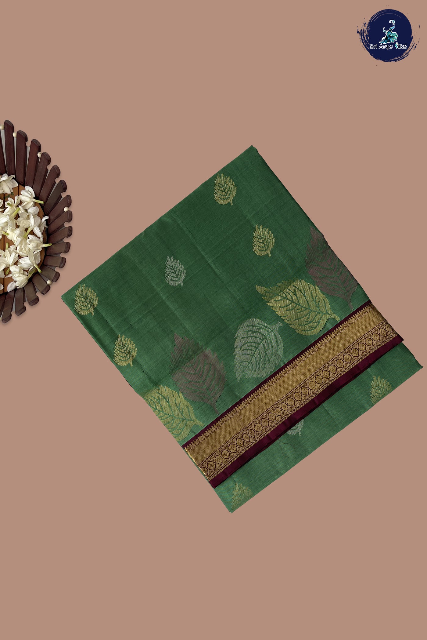 Green Soft Silk Saree With Zari Buttas Pattern