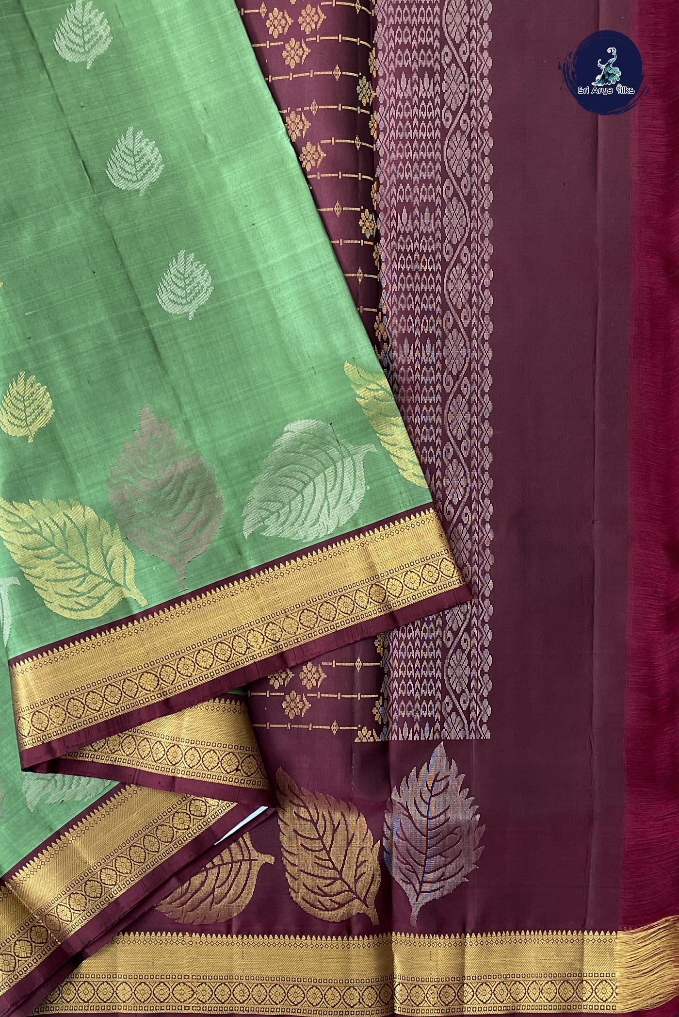 Green Soft Silk Saree With Zari Buttas Pattern