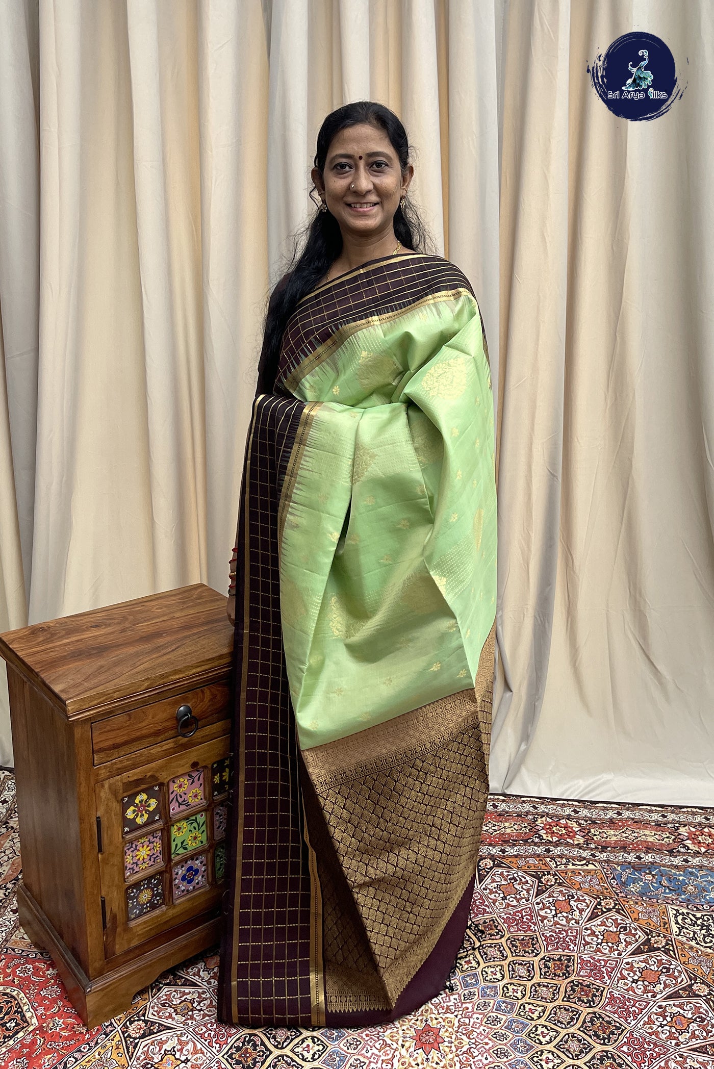 Pista Green Soft Silk Saree With Zari Buttas Pattern