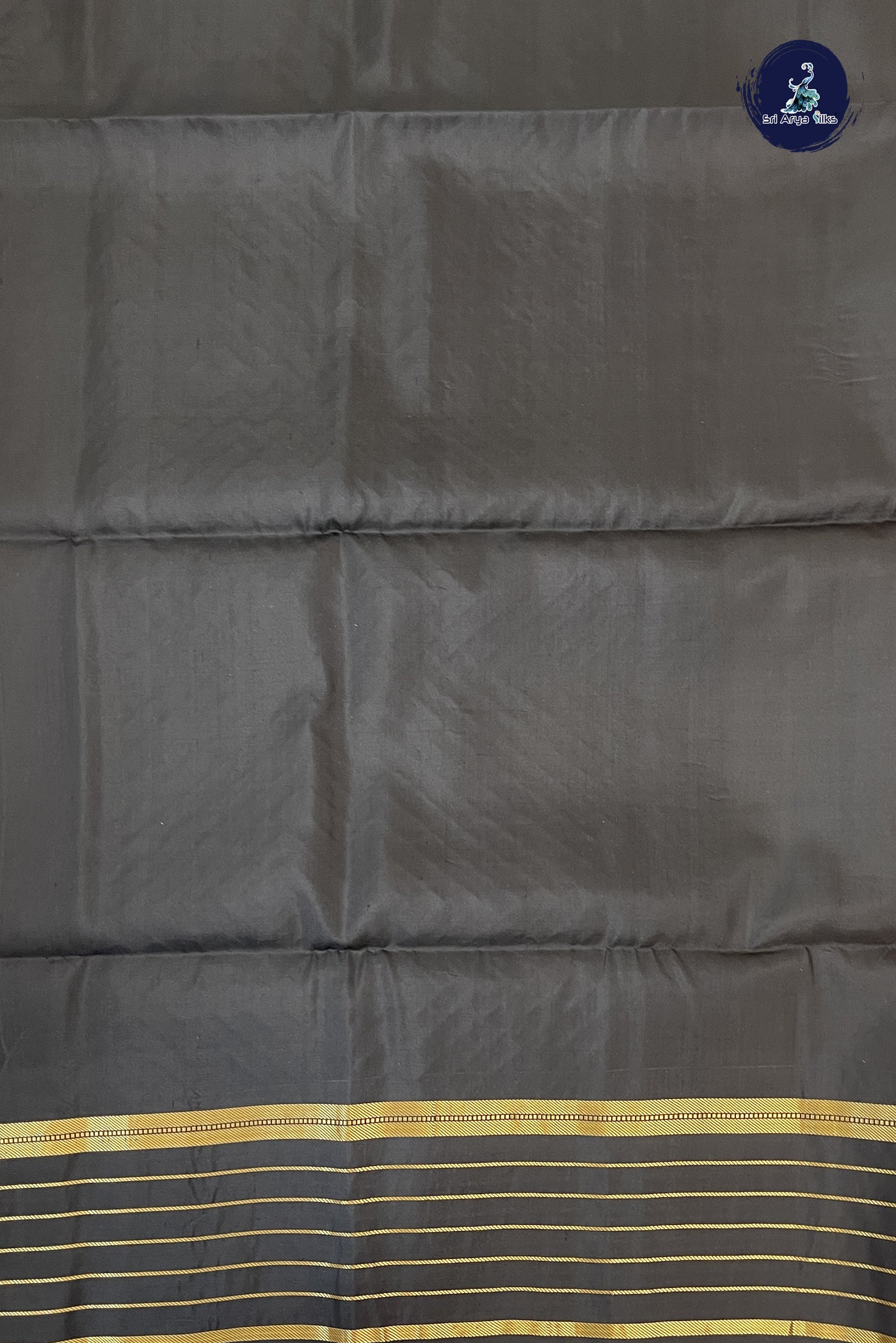 Cream Soft Silk Saree With Zari Buttas Pattern