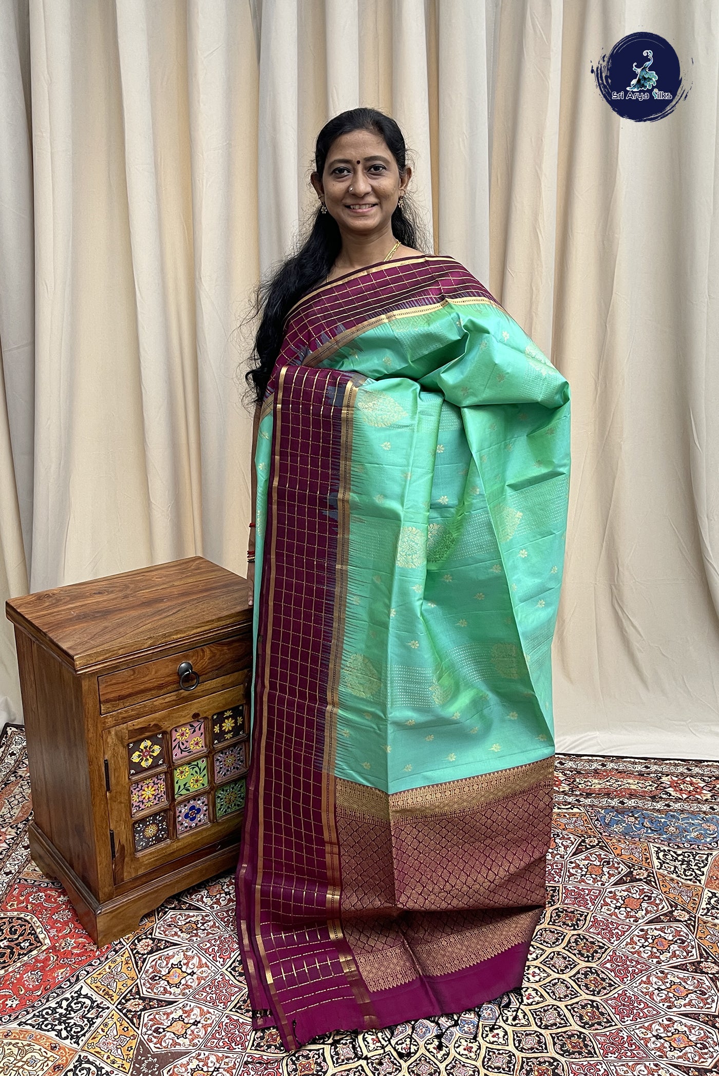 Turquoise Soft Silk Saree With Zari Buttas Pattern