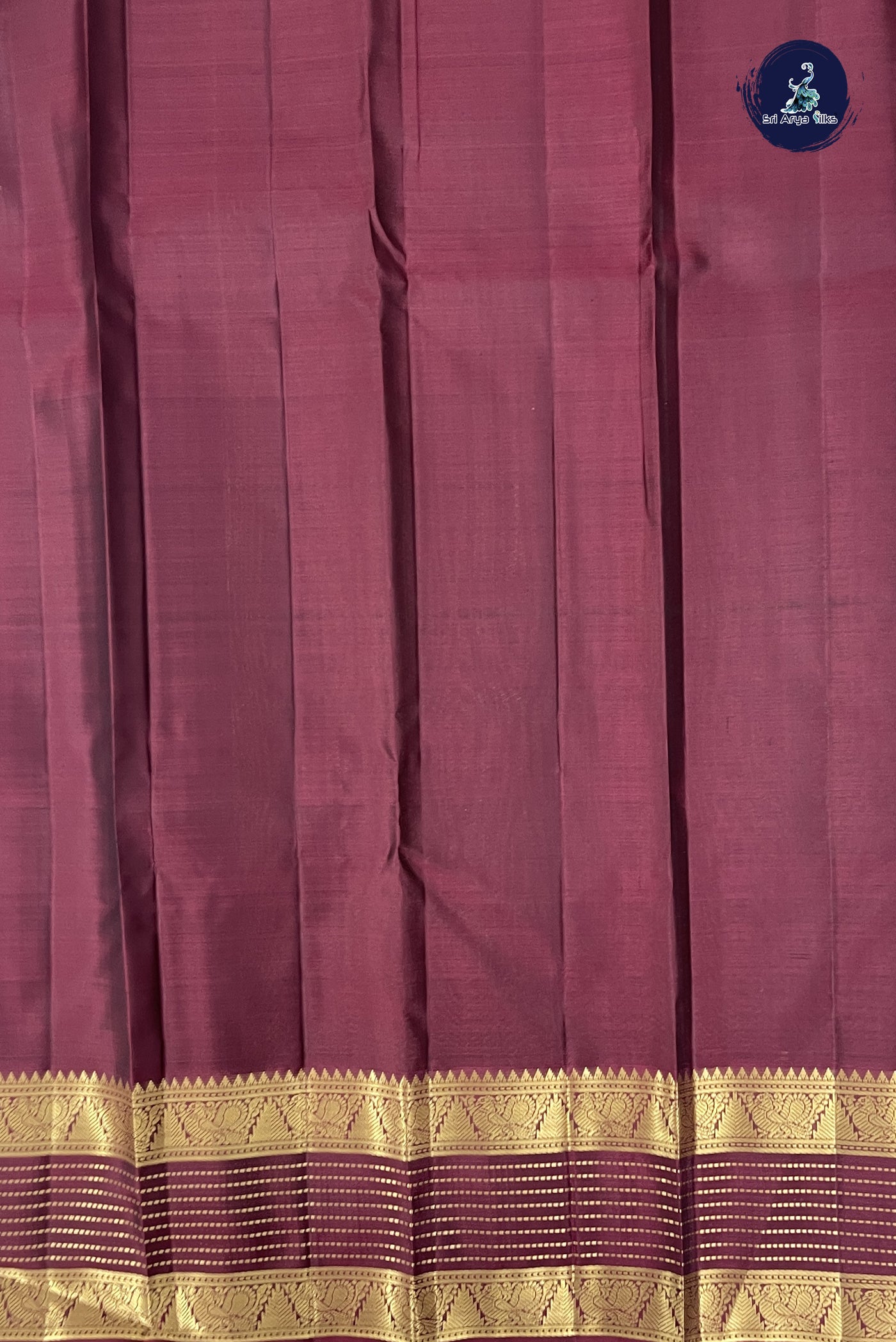 Dark Green Traditional Silk Saree With Zari Buttas Pattern