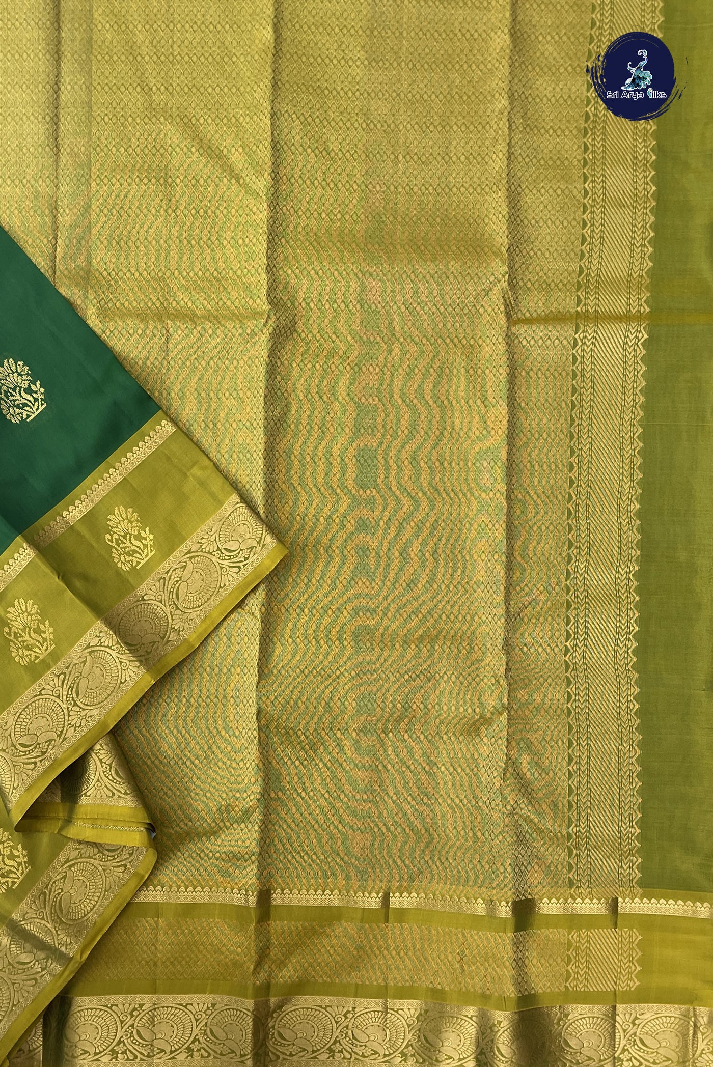 Dark Green Half Pure Silk Saree With Zari Buttas Pattern