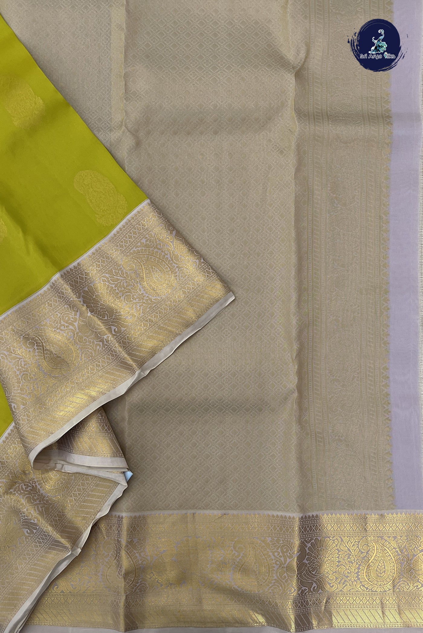 Lime Green Half Pure Silk Saree With Zari Buttas Pattern