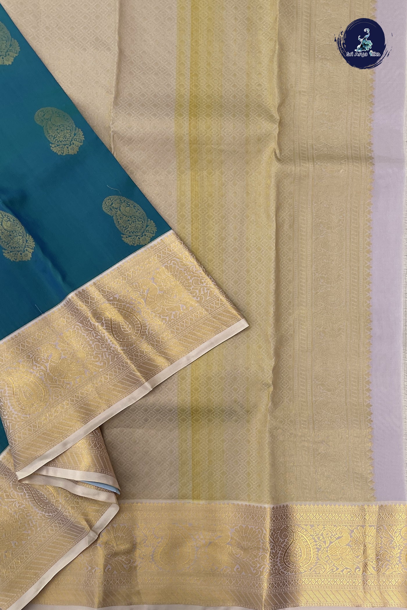 Teal Half Pure Silk Saree With Zari Buttas Pattern