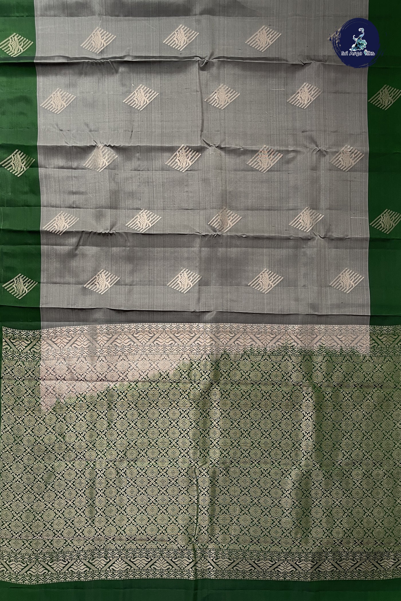 Grey Half Pure Silk Saree With Zari Buttas Pattern