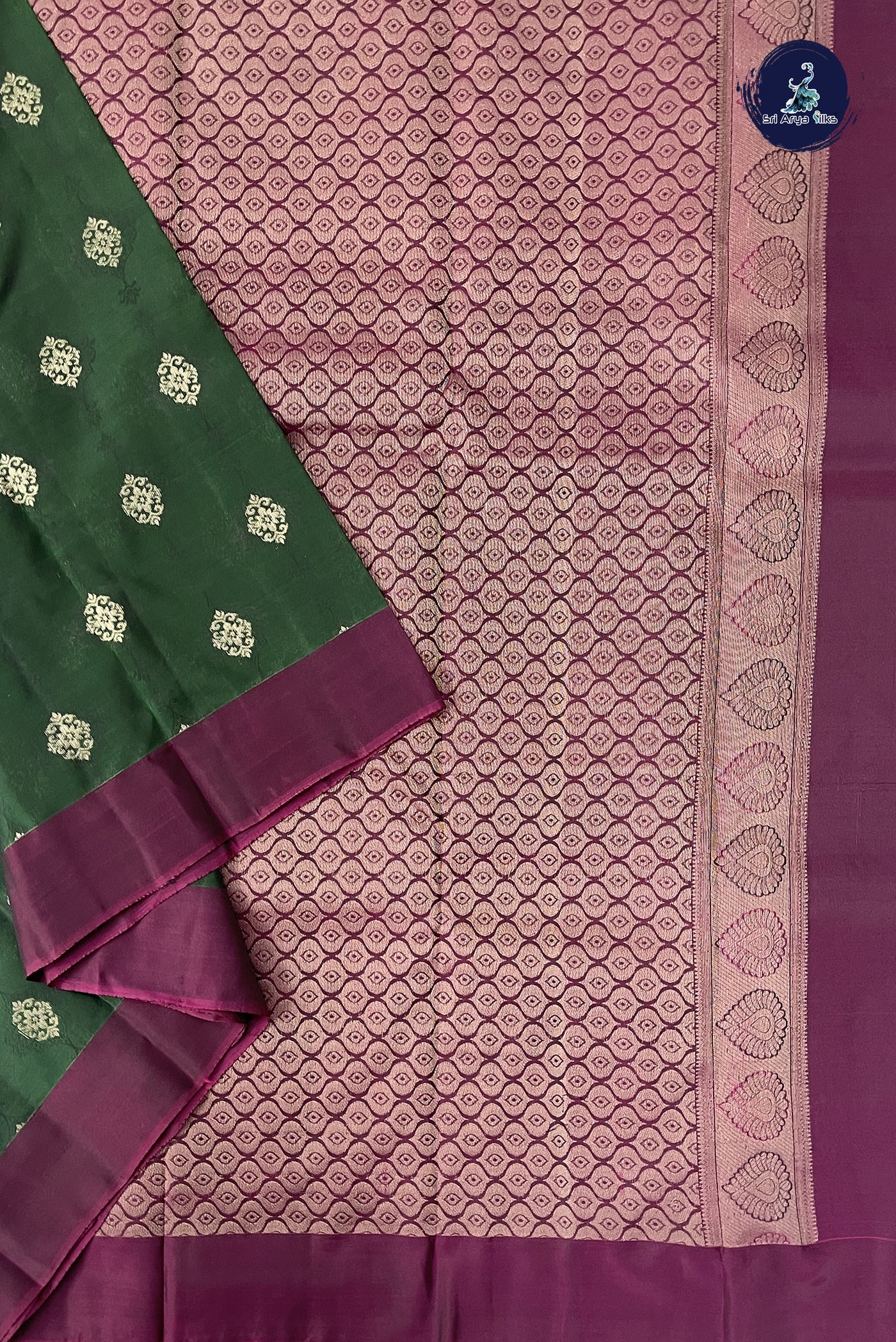 Bottle Green Half Pure Silk Saree With Embossed Pattern