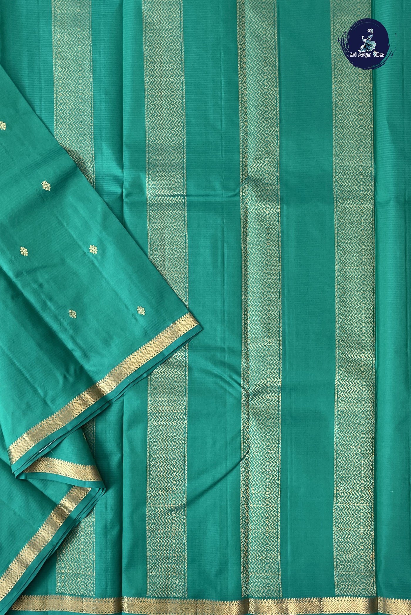 Teal Light Weight Silk Saree With Zari Buttas Pattern