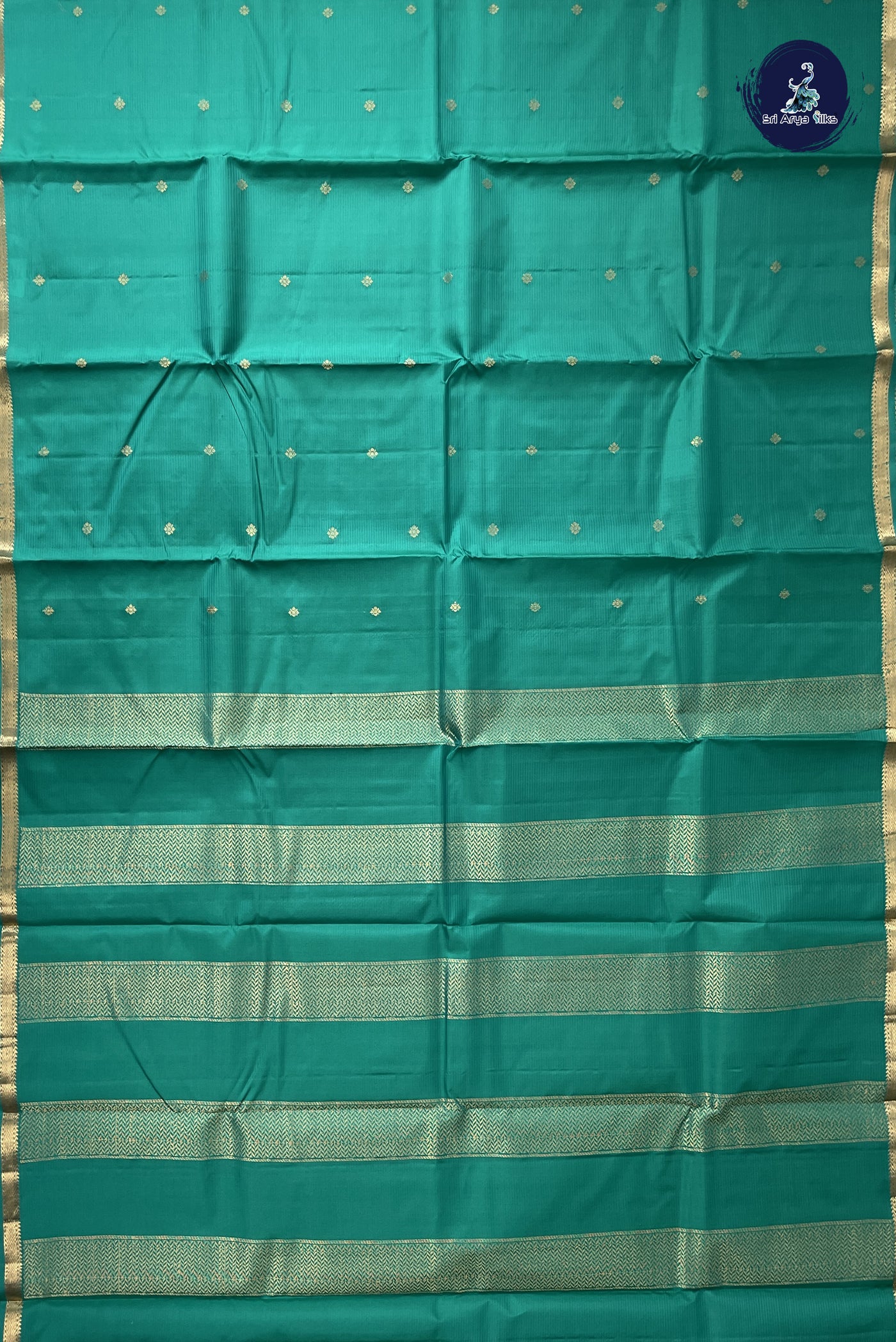 Teal Light Weight Silk Saree With Zari Buttas Pattern