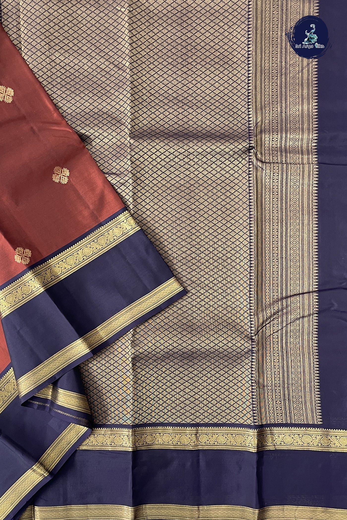 Rust Traditional Silk Saree With Zari Buttas Pattern