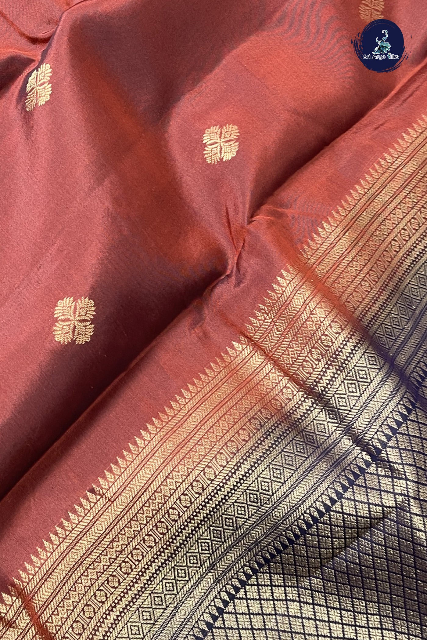 Rust Traditional Silk Saree With Zari Buttas Pattern