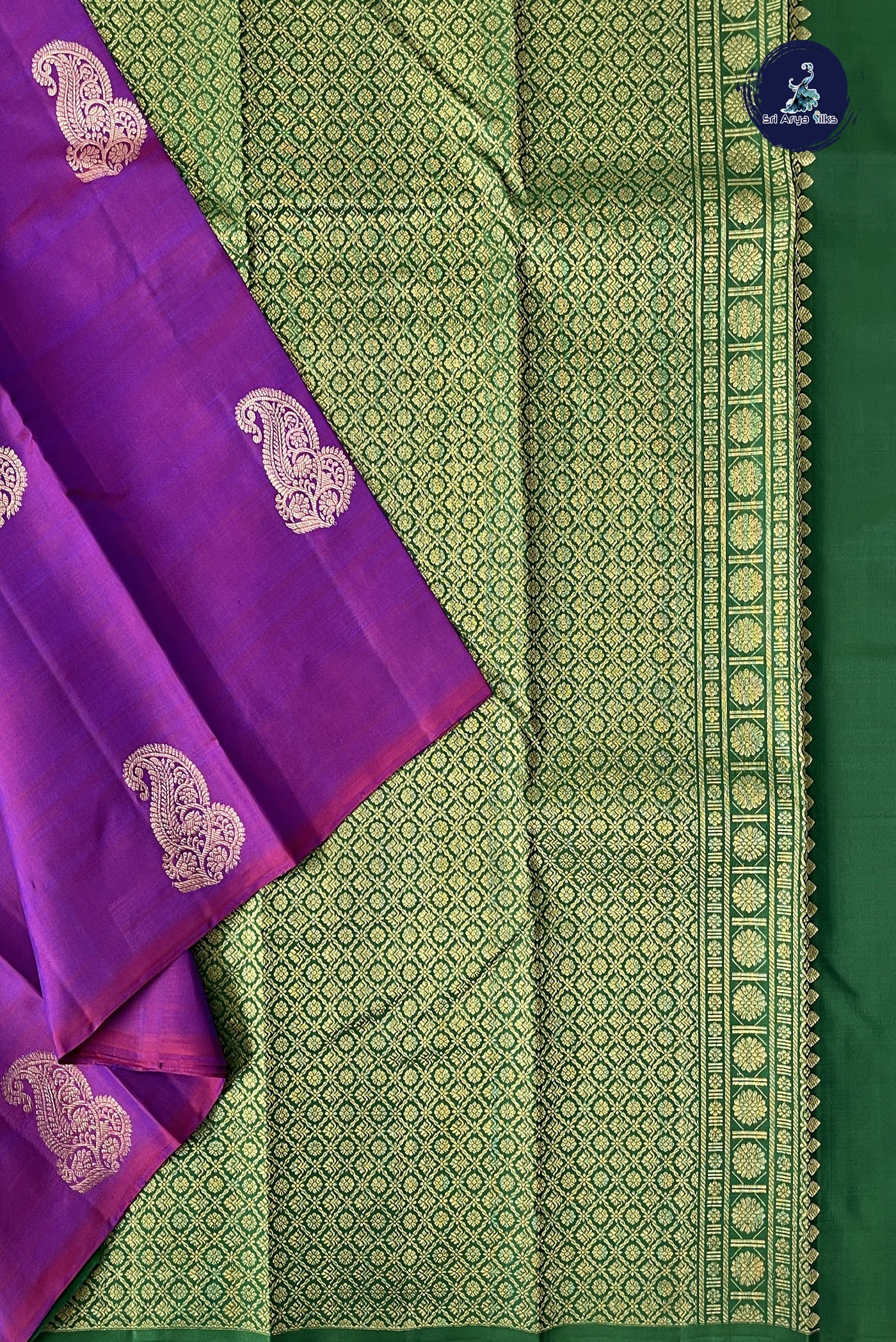 Dark Green Traditional Silk Saree With Zari Buttas Pattern