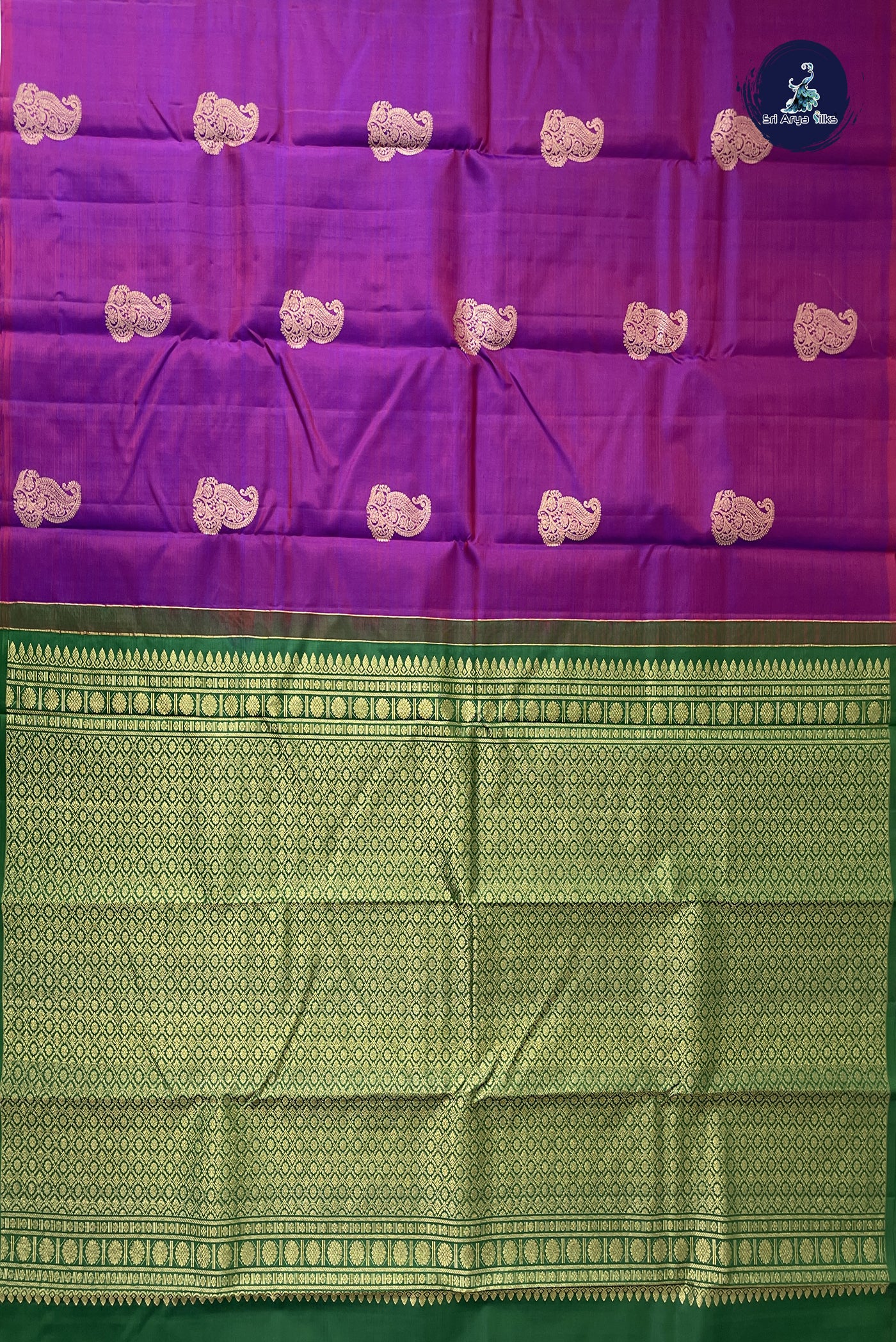 Dark Green Traditional Silk Saree With Zari Buttas Pattern