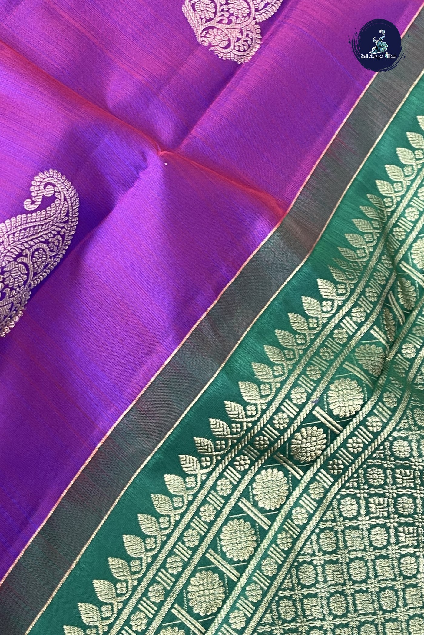 Dark Green Traditional Silk Saree With Zari Buttas Pattern