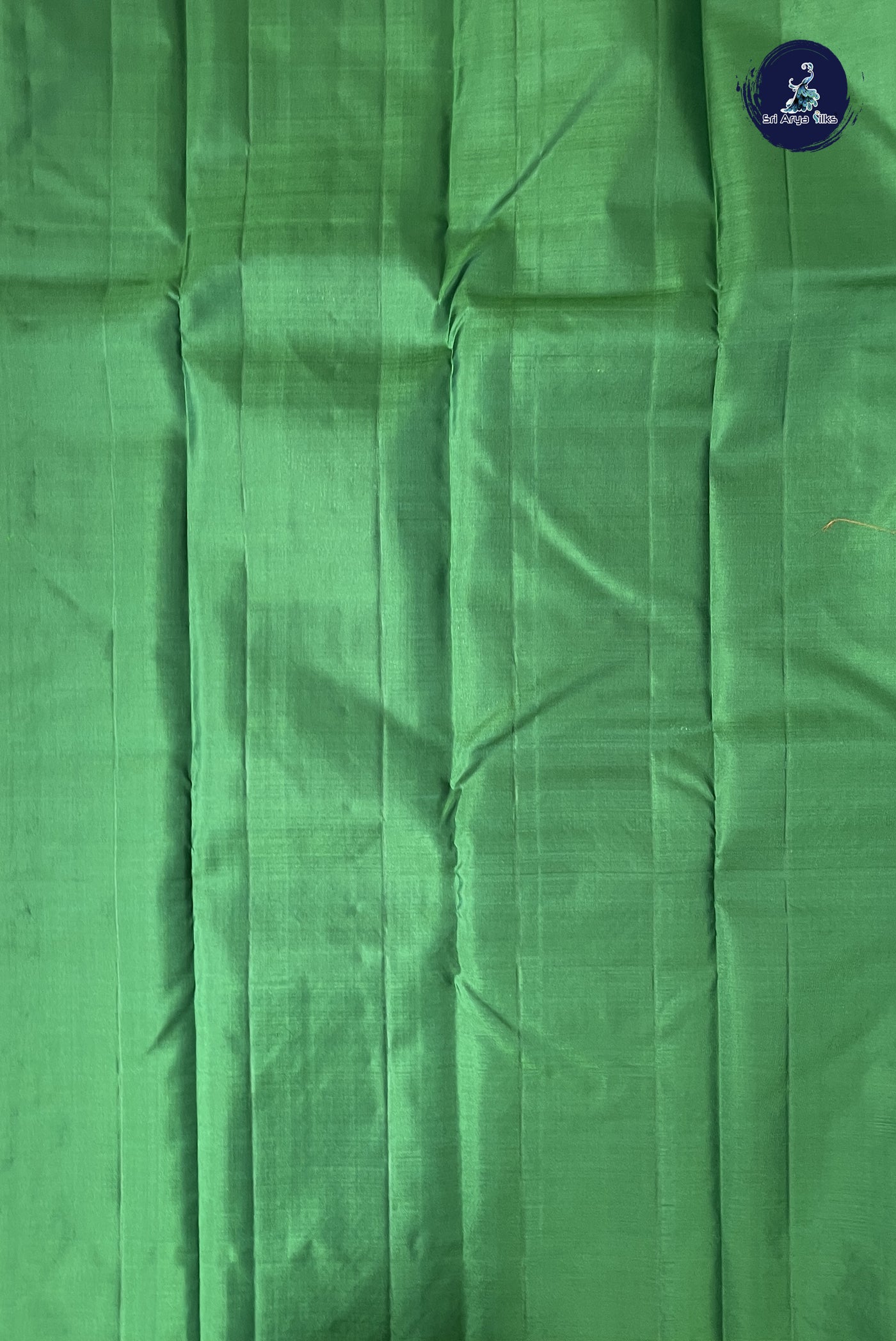 Dark Green Traditional Silk Saree With Zari Buttas Pattern