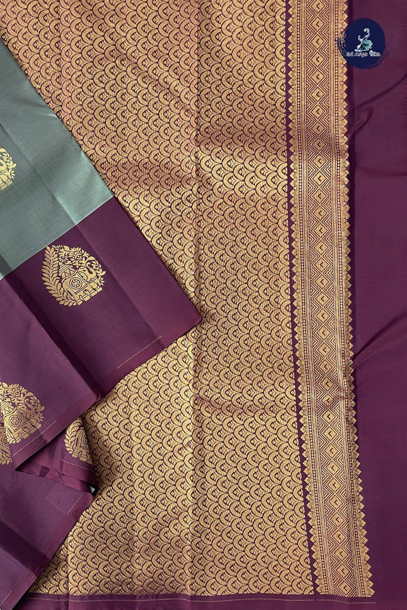 Greyish Green Half Pure Silk Saree With Zari Buttas Pattern