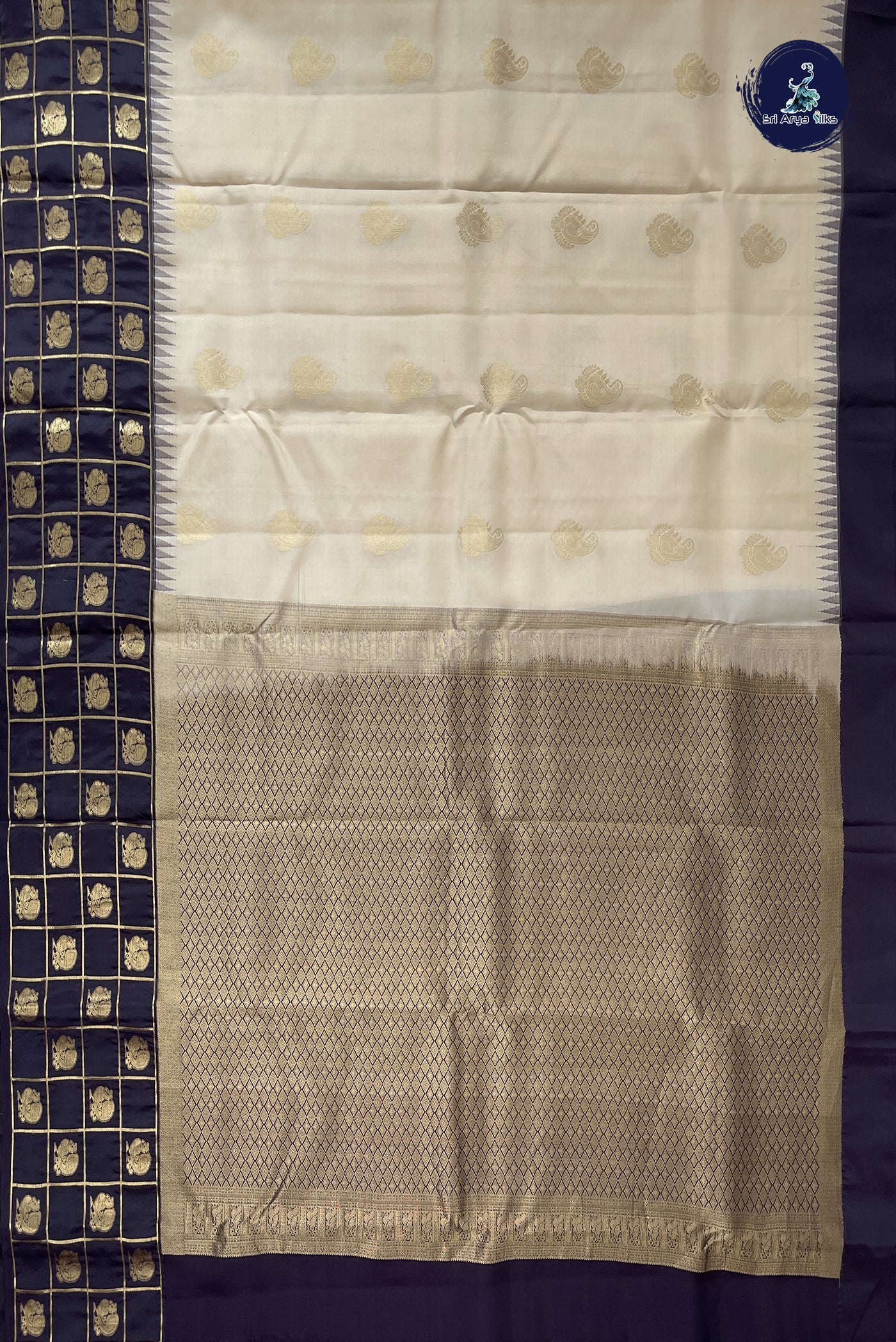Ivory Half Pure Silk Saree With Zari Buttas Pattern