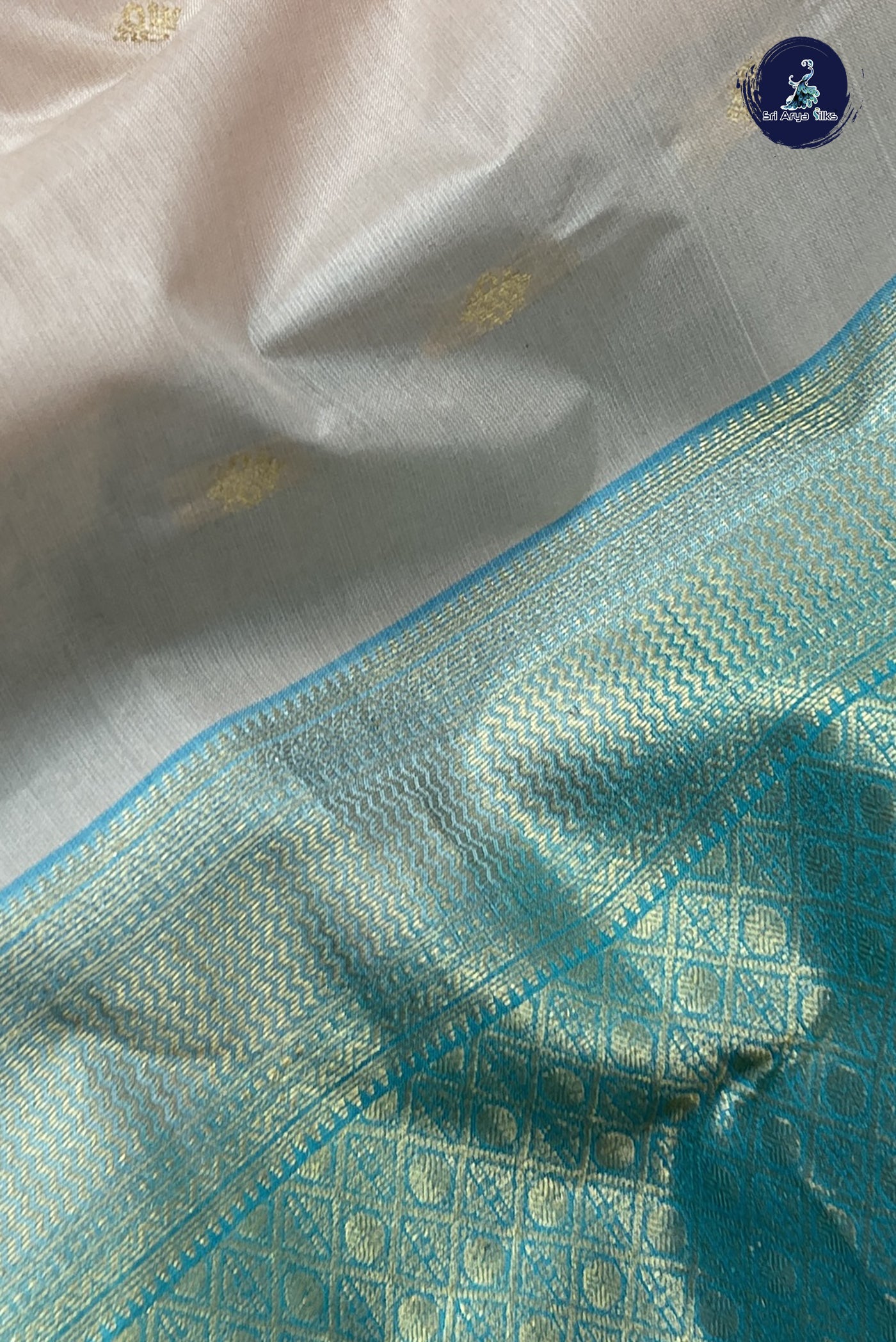 Pastel Shade Half Pure Silk Saree With Zari Buttas Pattern