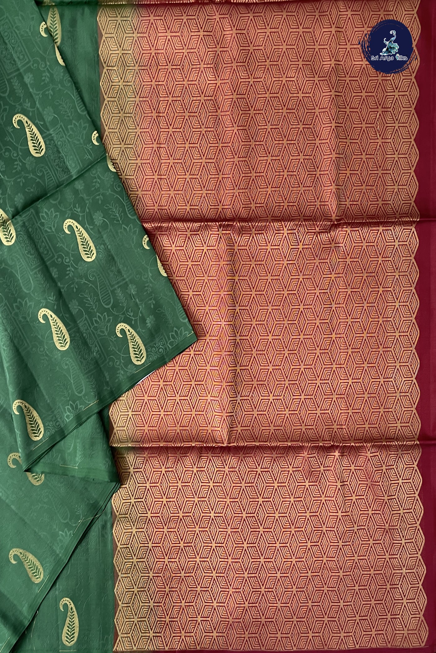 Dark Green Half Pure Silk Saree With Embossed Pattern