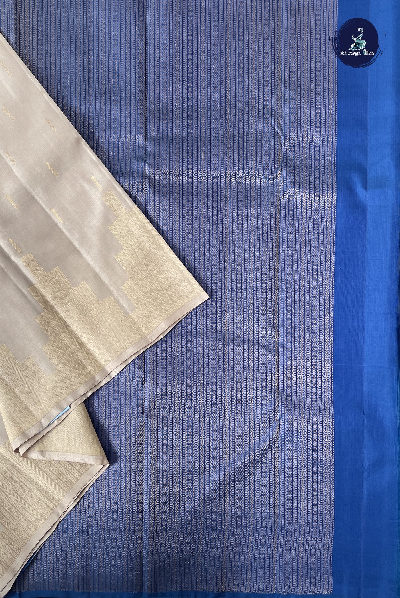 Ivory Half Pure Silk Saree With Zari Buttas Pattern