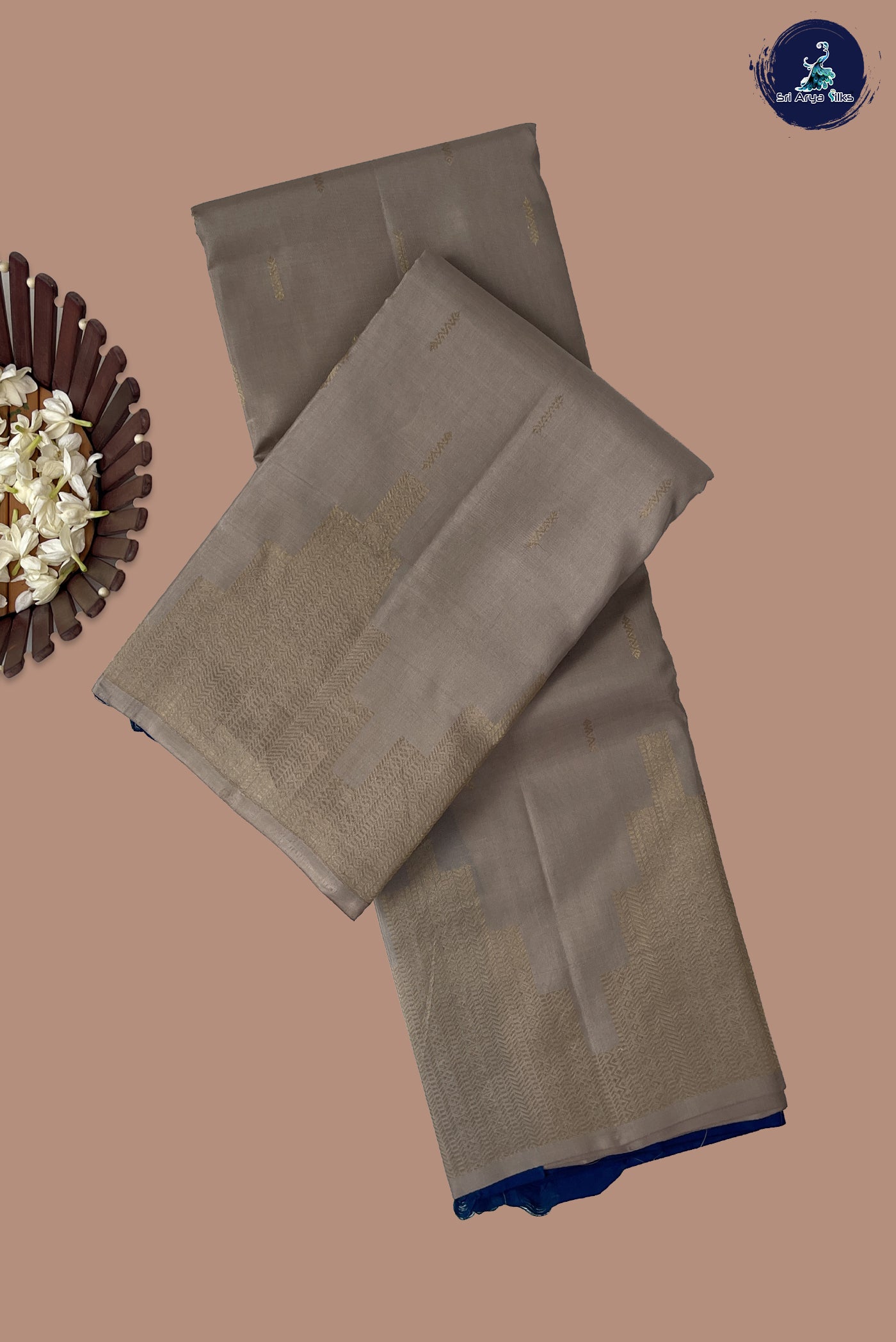 Ivory Half Pure Silk Saree With Zari Buttas Pattern