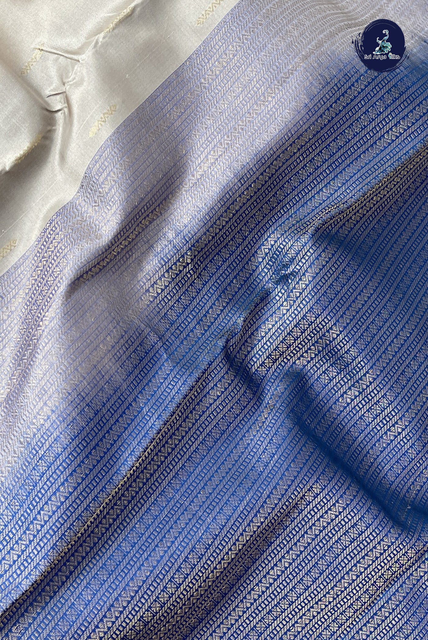 Ivory Half Pure Silk Saree With Zari Buttas Pattern