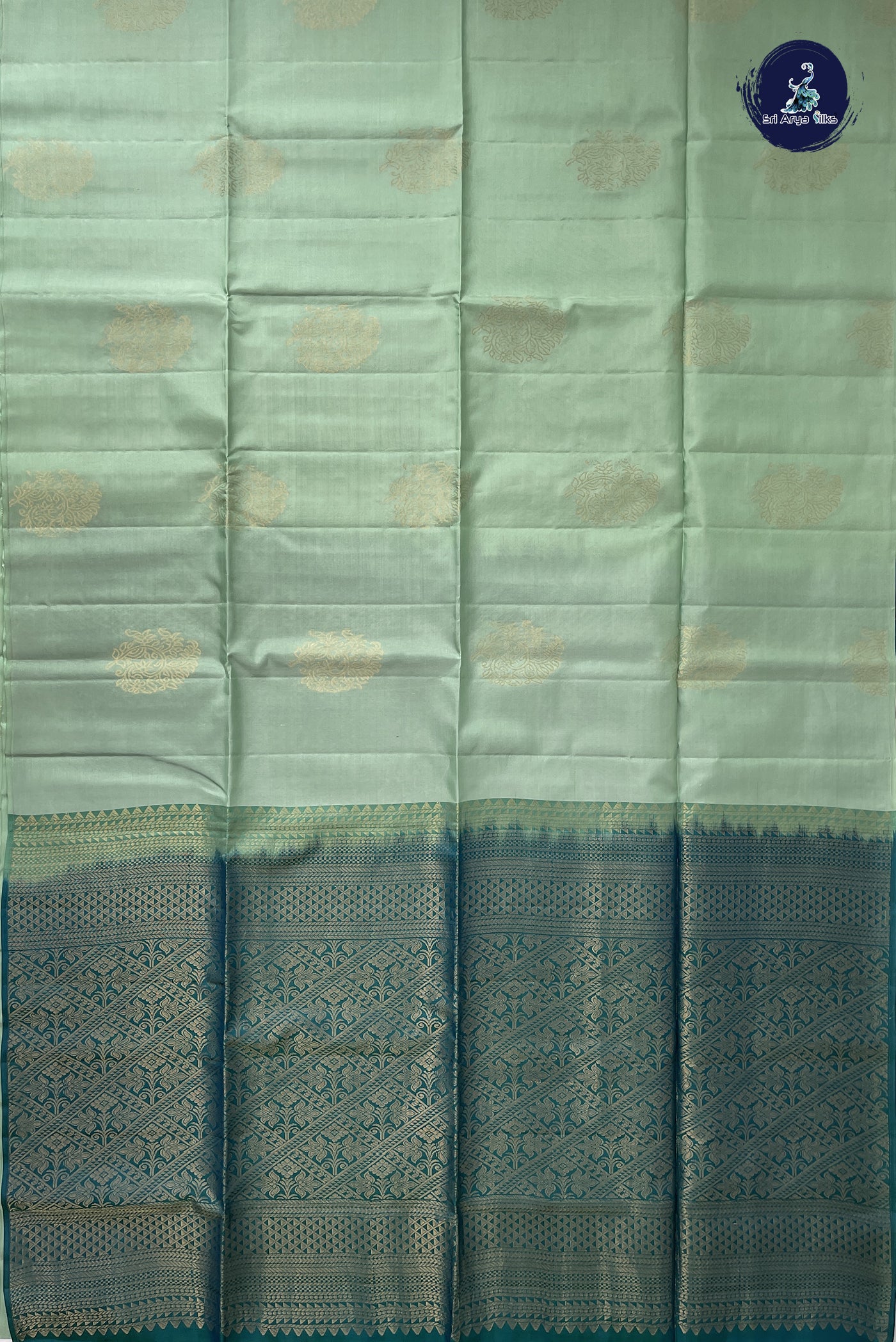 Pista Green Half Pure Silk Saree With Zari Buttas Pattern