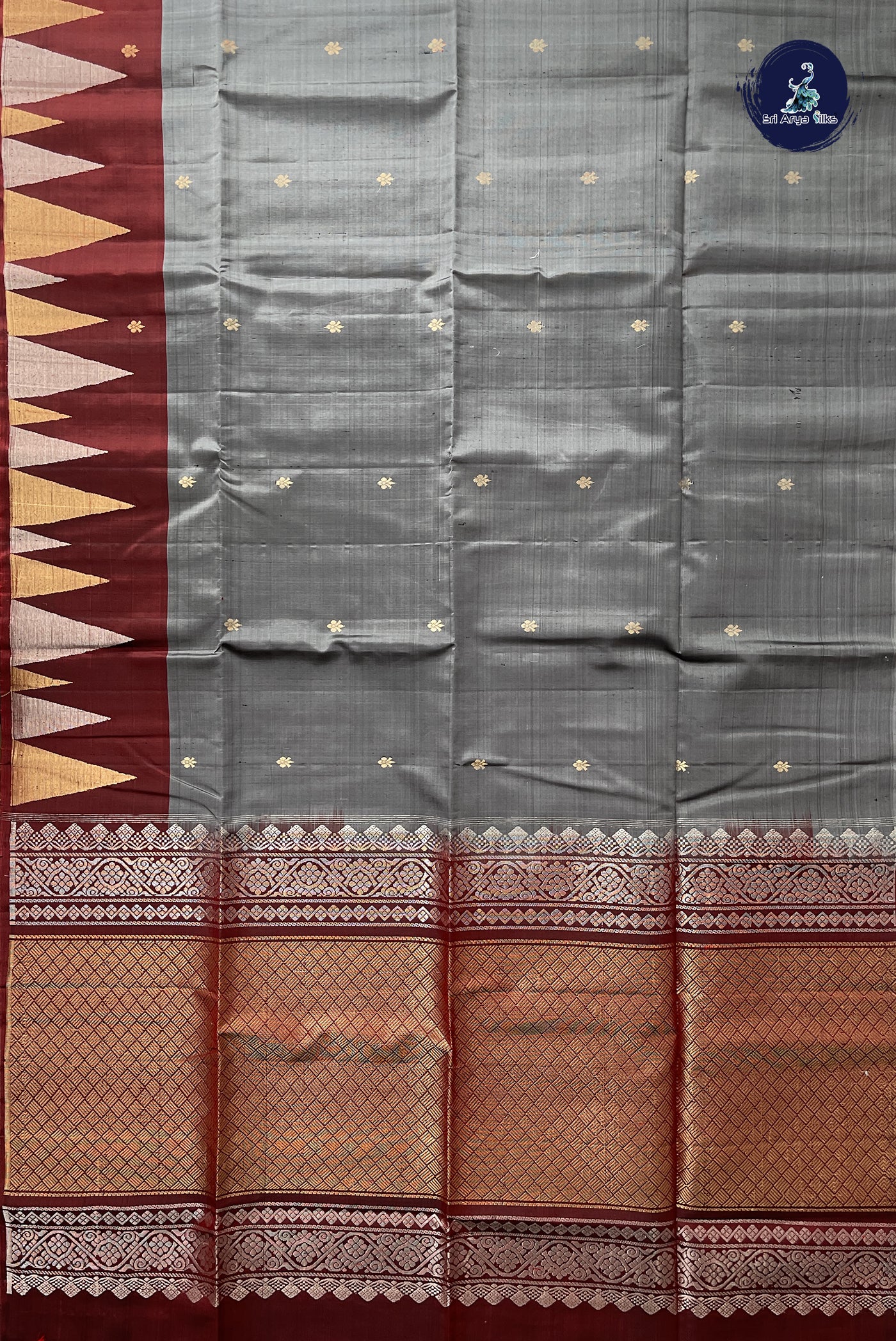 Grey Soft Silk Saree With Zari Buttas Pattern