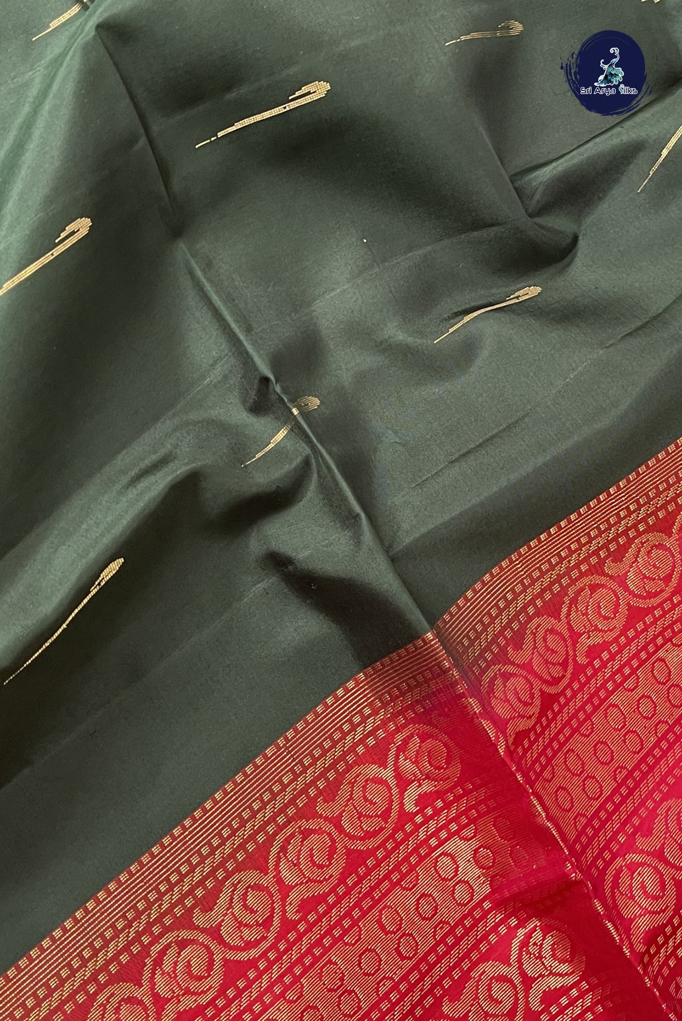 Dark Green Soft Silk Saree With Zari Buttas Pattern