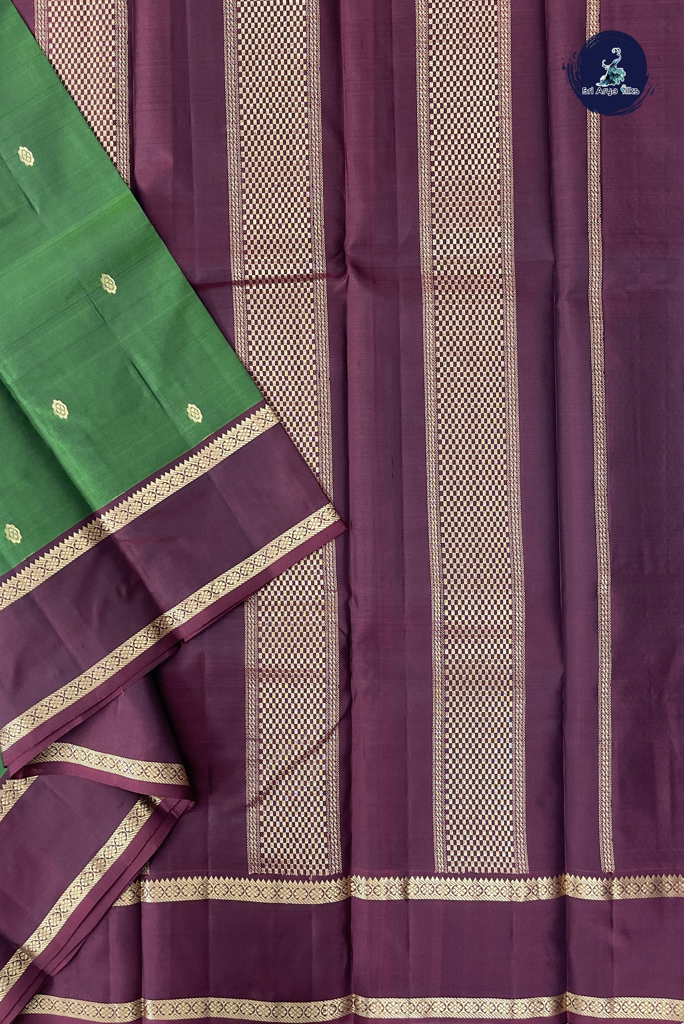 Green Light Weight Silk Saree With Zari Buttas Pattern
