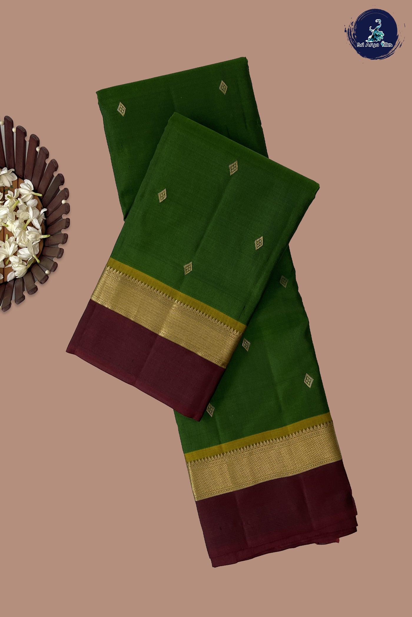 Green Light Weight Silk Saree With Zari Buttas Pattern