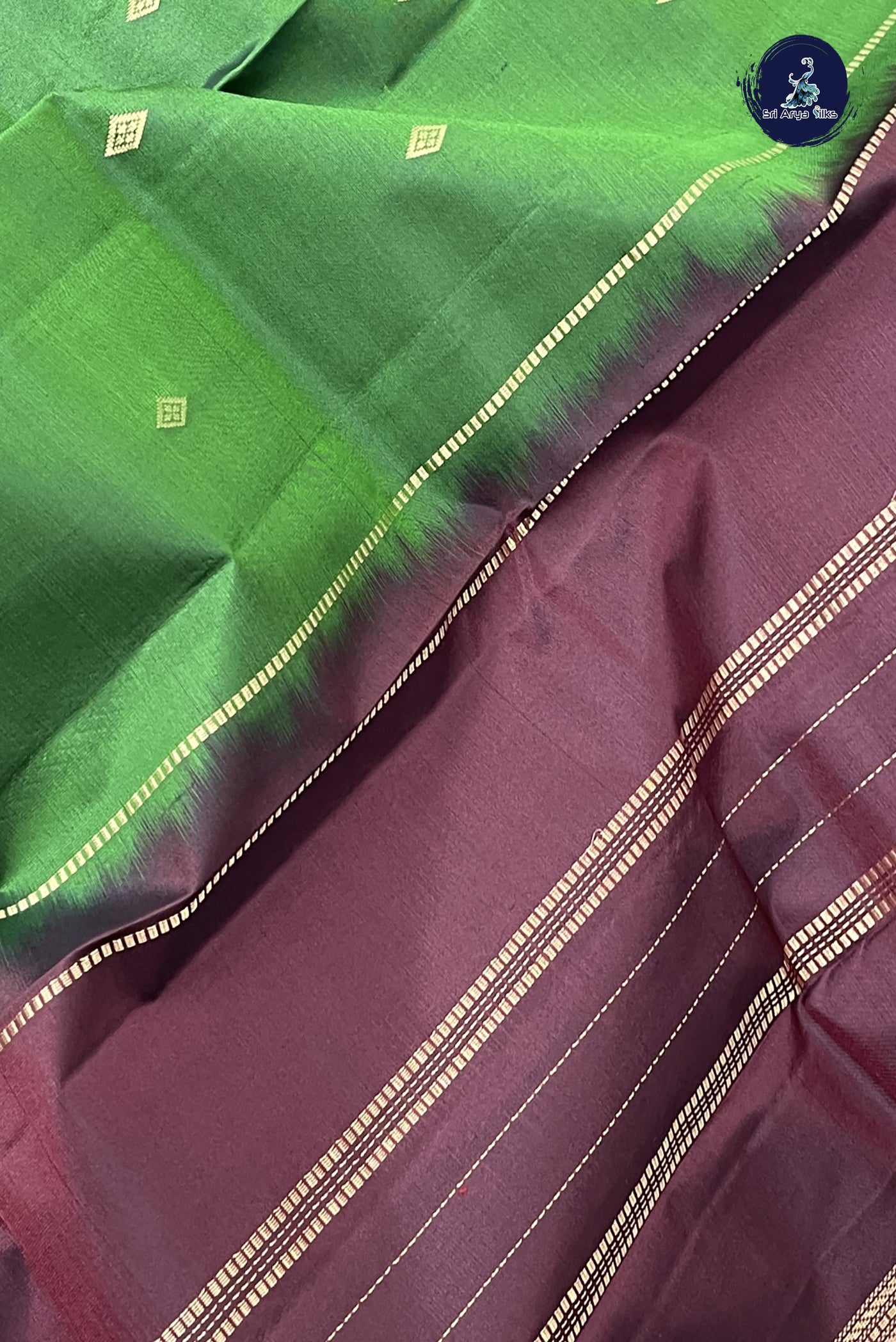 Green Light Weight Silk Saree With Zari Buttas Pattern
