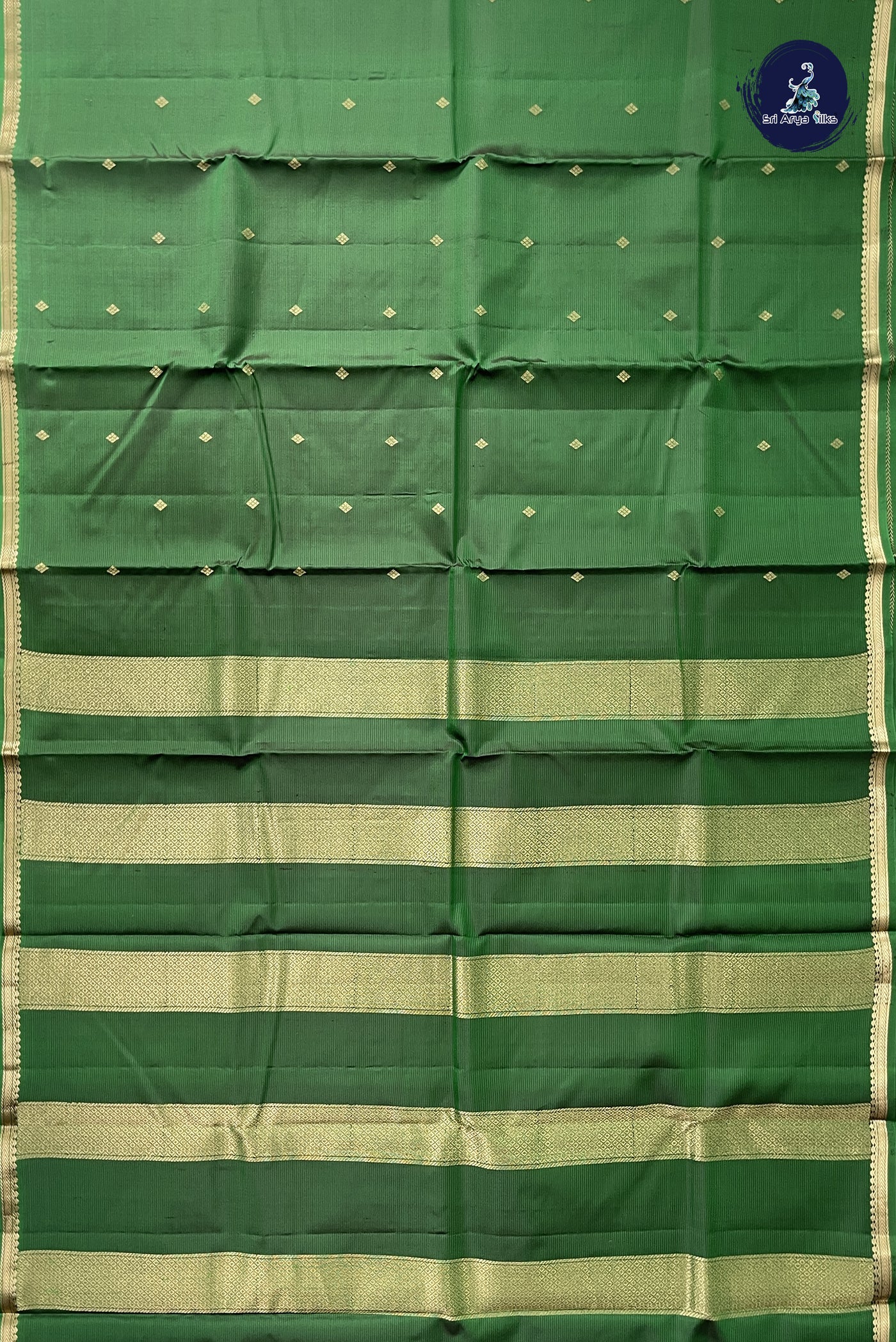 Bottle Green Light Weight Silk Saree With Zari Buttas Pattern