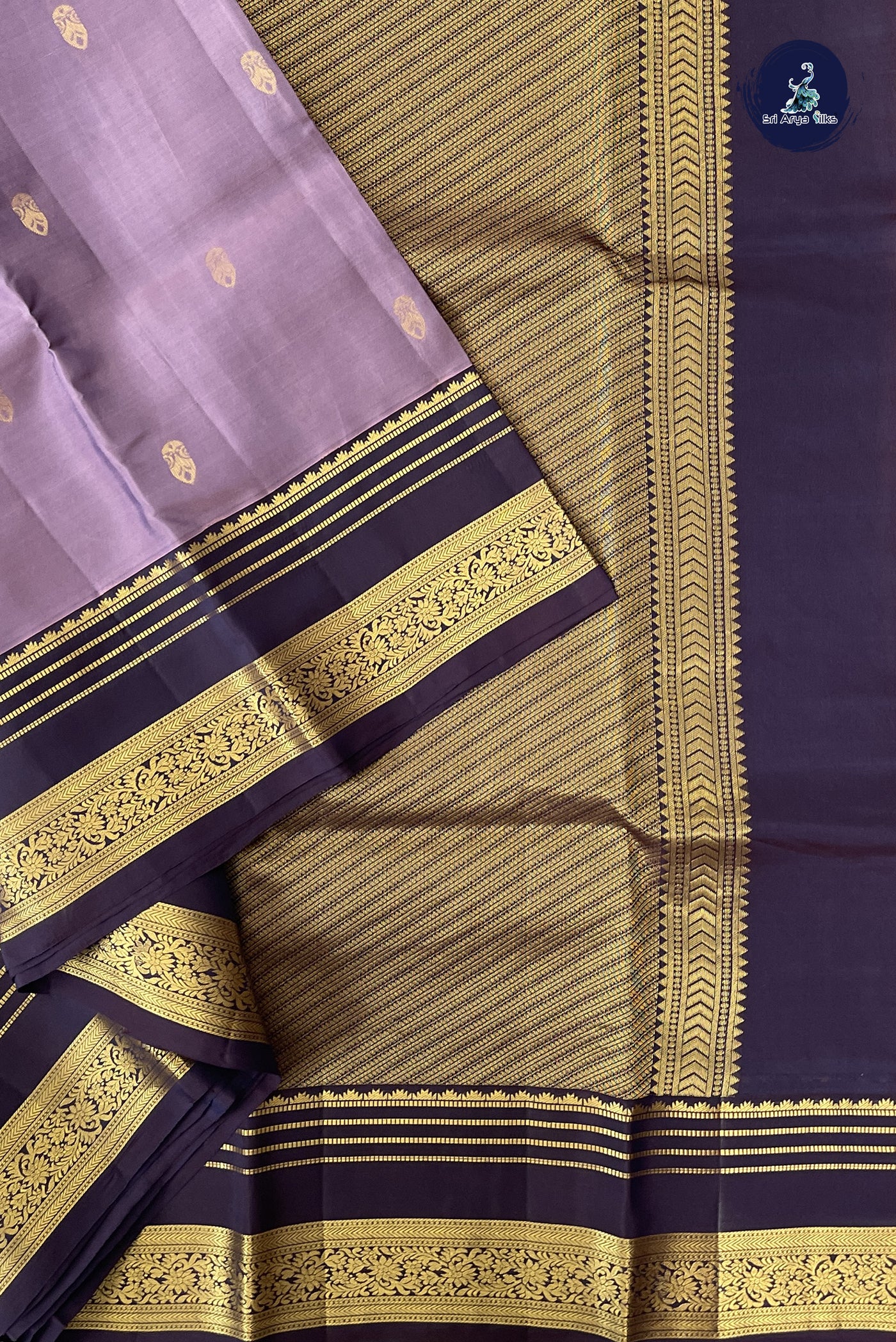 Mauve Half Pure Silk Saree With Zari Buttas Pattern